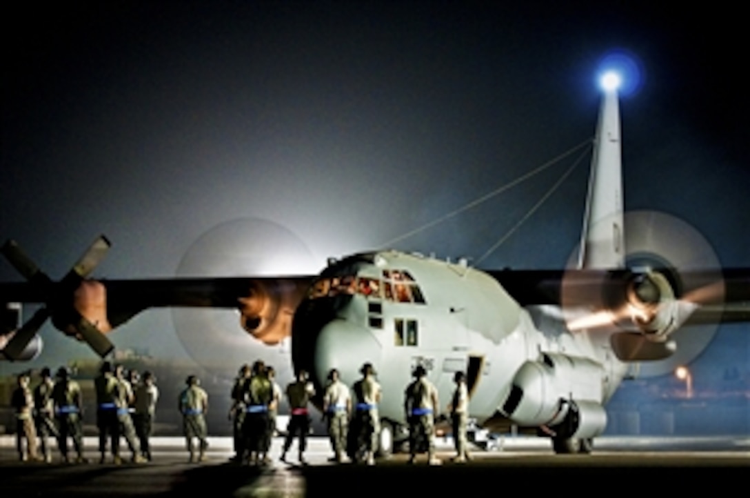 U.S. Air Force airmen prepare an EC-130H Compass Call aircraft for its final departure from an air base in Southwest Asia, Aug. 29, 2010. The plane's unit, the 43rd Expeditionary Electronic Combat Squadron, is moving to another base in the Middle East.