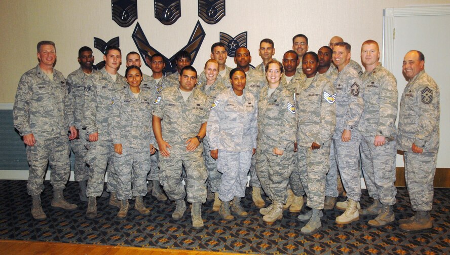 KUNSAN AIR BASE, Republic of Korea -- Members of the 8th Logistics Readiness Squadron celebrate their selection for promotion to staff sergeant Aug. 27. Approximately 215 Wolf Pack senior airmen were selected Aug. 19 to pin on the rank. (U.S. Air Force photo/Senior Airman Ciara Wymbs)