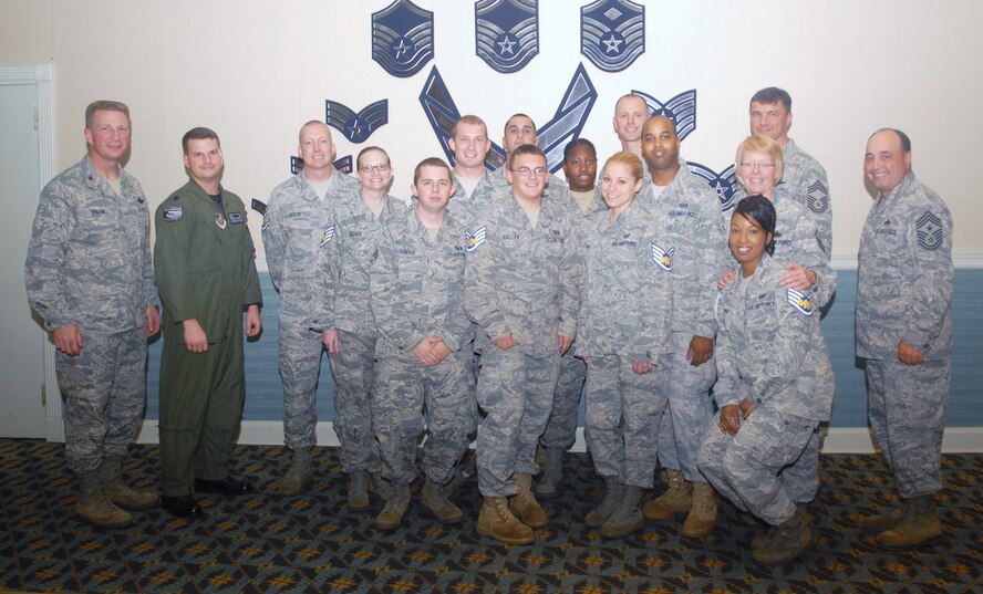 KUNSAN AIR BASE, Republic of Korea -- Members of the 8th Operations Group celebrate their selection for promotion to staff sergeant Aug. 27. Approximately 215 Wolf Pack senior airmen were selected Aug. 19 to pin on the rank. (U.S. Air Force photo/Senior Airman Ciara Wymbs)