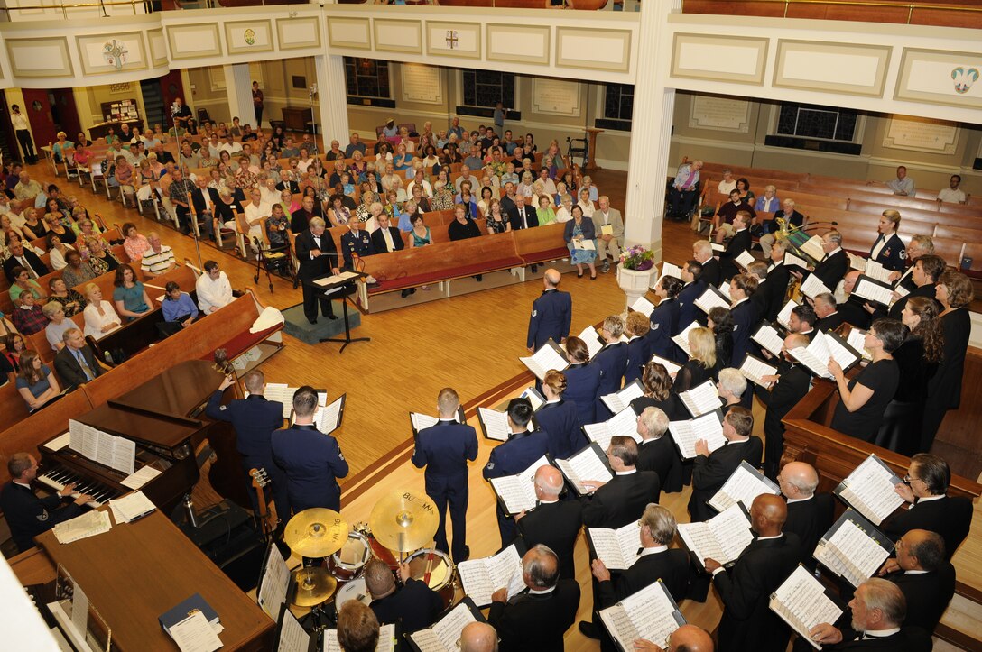 The U.S. Air Force Band Singing Sergeants performed a special alumni concert Aug. 7 at the New York Avenue Presbyterian Church in D.C. The program featured past and present members of the official chorus of the U.S. Air Force. Retired Lt. Col. Craig Jessop, former conductor of the Singing Sergeants and former award-winning conductor of the Mormon Tabernacle Choir, conducted the program. (U.S. Air Force photo by Senior Airman Jaclyn McDonald)