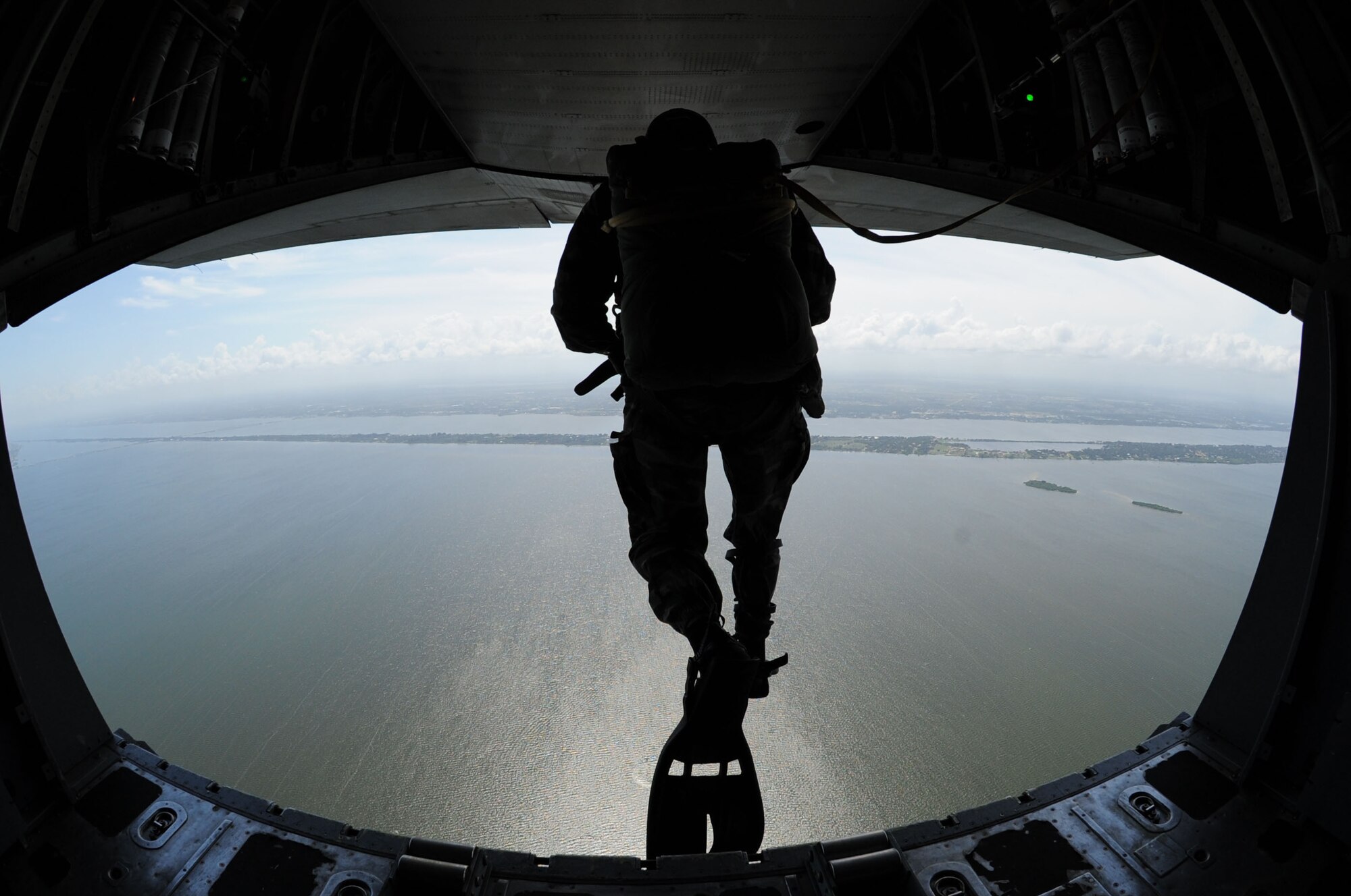 PATRICK AIR FORCE BASE, Fla. - Ten members of the Uruguayan armed forces visited the 920th Rescue Wing here Aug 29 - Sept 2, 2010 to get hands rescue orientation and training. The Uruguayan team was made up of pilots, a loadmaster and jumpers which are the equivalent to U.S. Air Force pararescuemen (PJs). Due to the dense fluvial network that covers the country, these rescue specialists continue to work with the Florida PJs and Rescue crews to hone their skills and exchange vital information in rescue techniques shown here as they practice water rescue training in the Banana River. (U.S. Air Force Photo/Master Sgt. Rob Grande)
