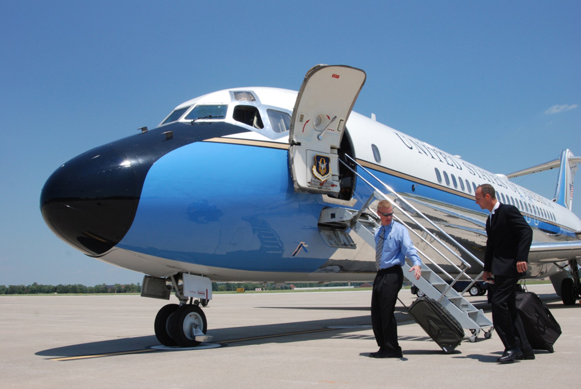 Air Force Reserve Command's 932nd Airlift Wing pilots get their travel gear ready to stow shortly before taking off on a mission.  The wing has three of the aircraft used for the DV (distinguished visitor) mission.  (U.S. Air Force photo/Maj. Stan Paregien)