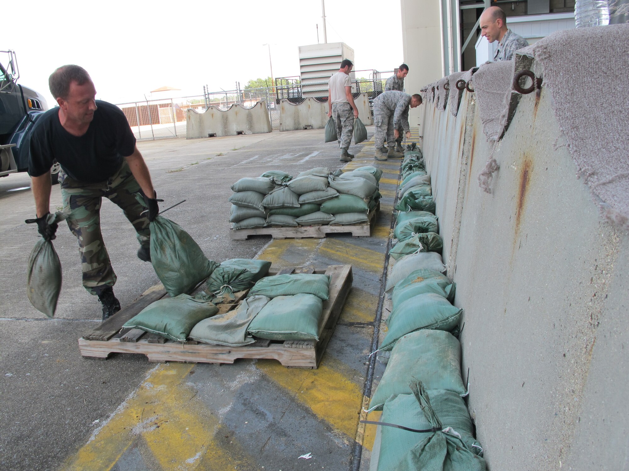 As Hurricane Earl heads towards the Cape and Islands Master Sergeant Patrick Ryan along with other members of the 102d Intelligence Wing lay sand bag walls to protect buildings from flooding. Hurricane Earl is expected to reach Cape Cod by late Friday.