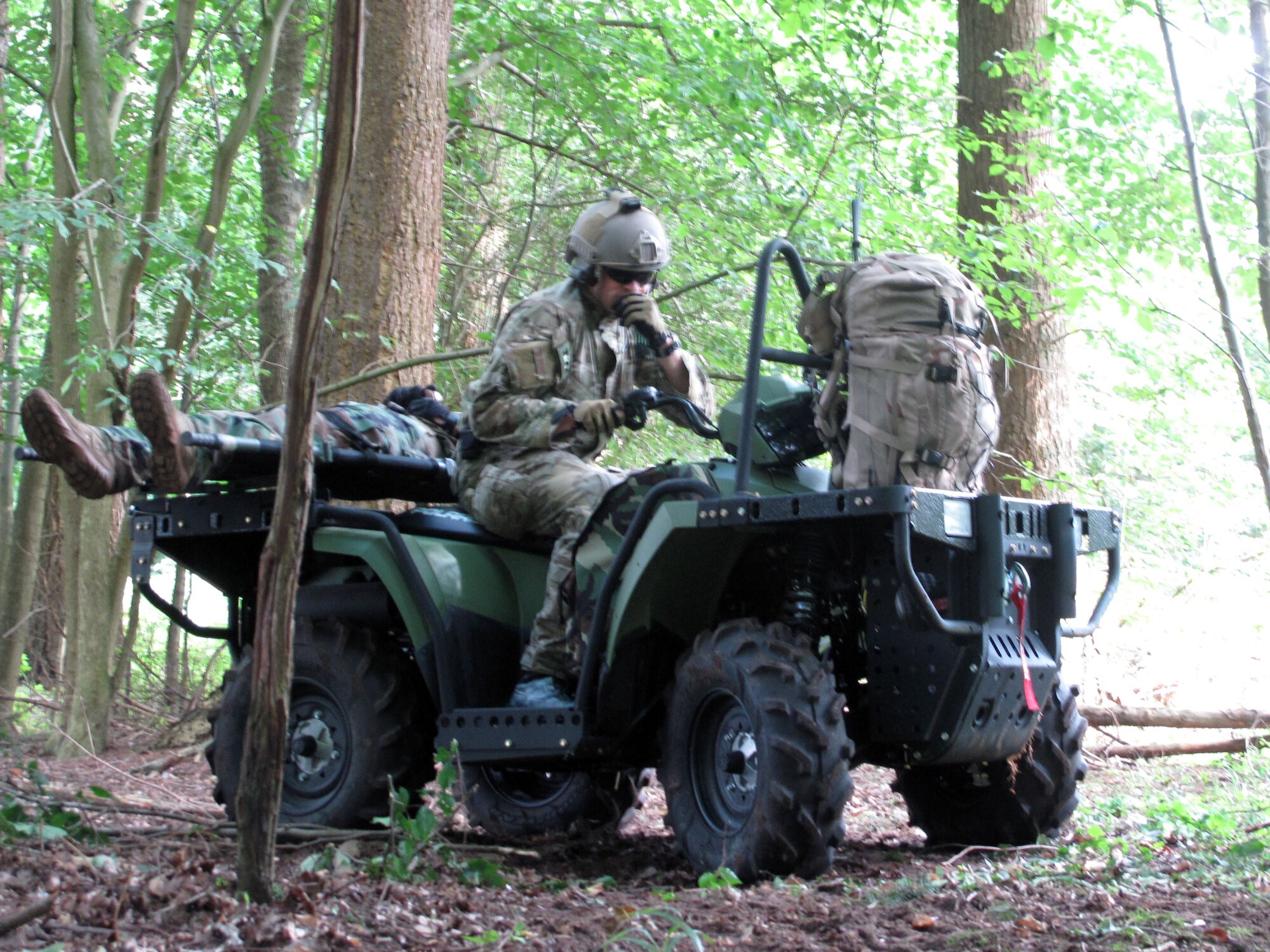Senior Airman Nathan Simonson, 56th Rescue Squadron pararescue apprentice, transports a patient during a training exercise in Stanton, England Sept. 2. Airman Simonson was nominated for a Liberty Spotlight because he displays the core value of 'Service Before Self'. (U.S. Air Force/coutesy photo)