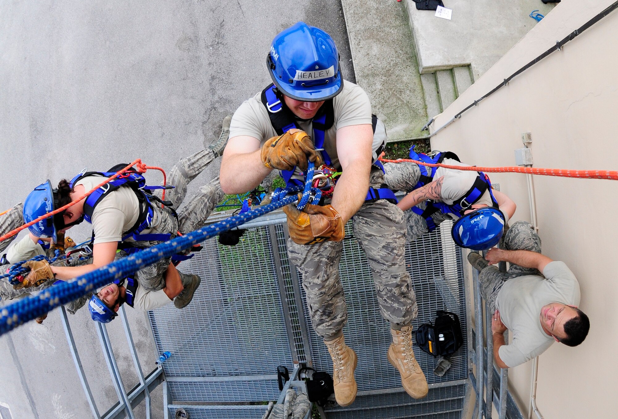 Tech. Sgt. John Healey, 31st Civil Engineer firefighter, repels from the Mensa using technical rope maneuvers during specialized rescue training Aug. 26. The 80-hour training course included classroom education and 73 hours of practical application consisting of automobile extrication, technical rope and confined space rescues. (U.S. Air Force photo/Airman 1st Class Katherine Windish)