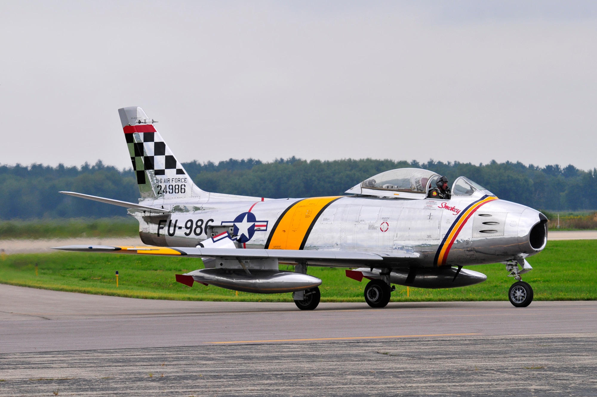 Paul Wood taxis a Korean War Vintage F-86 Saber Jet at Volk Field Open House, 21 Aug 2010.  (U.S. Air Force photo courtesy Joe Oliva) (RELEASED).