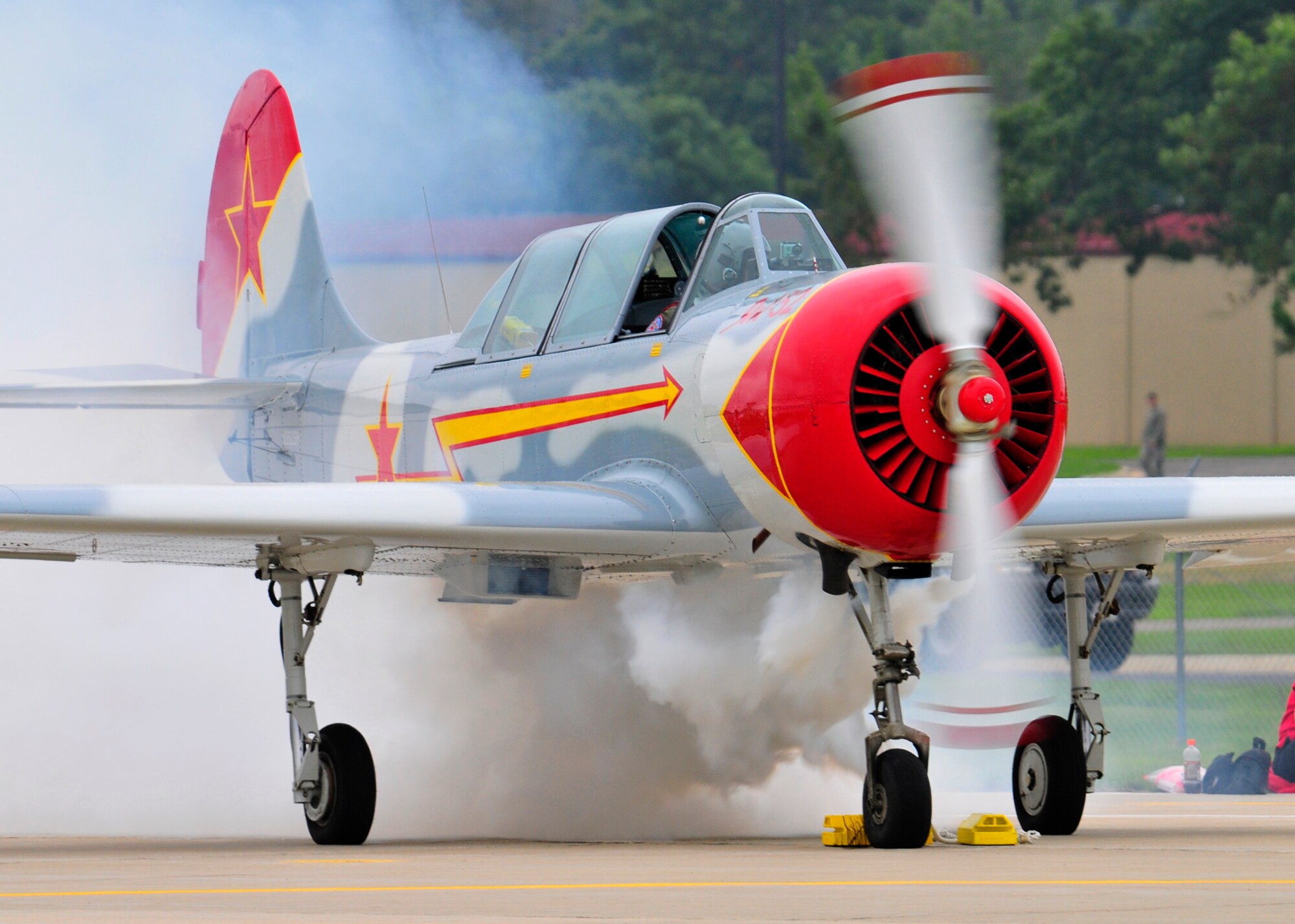 Mike Love starts up his Russian Yak-52 prior to his Airshow performance at Volk Field Open House, 21 Aug 2010.  (U.S. Air Force photo courtesy Joe Oliva) (RELEASED)