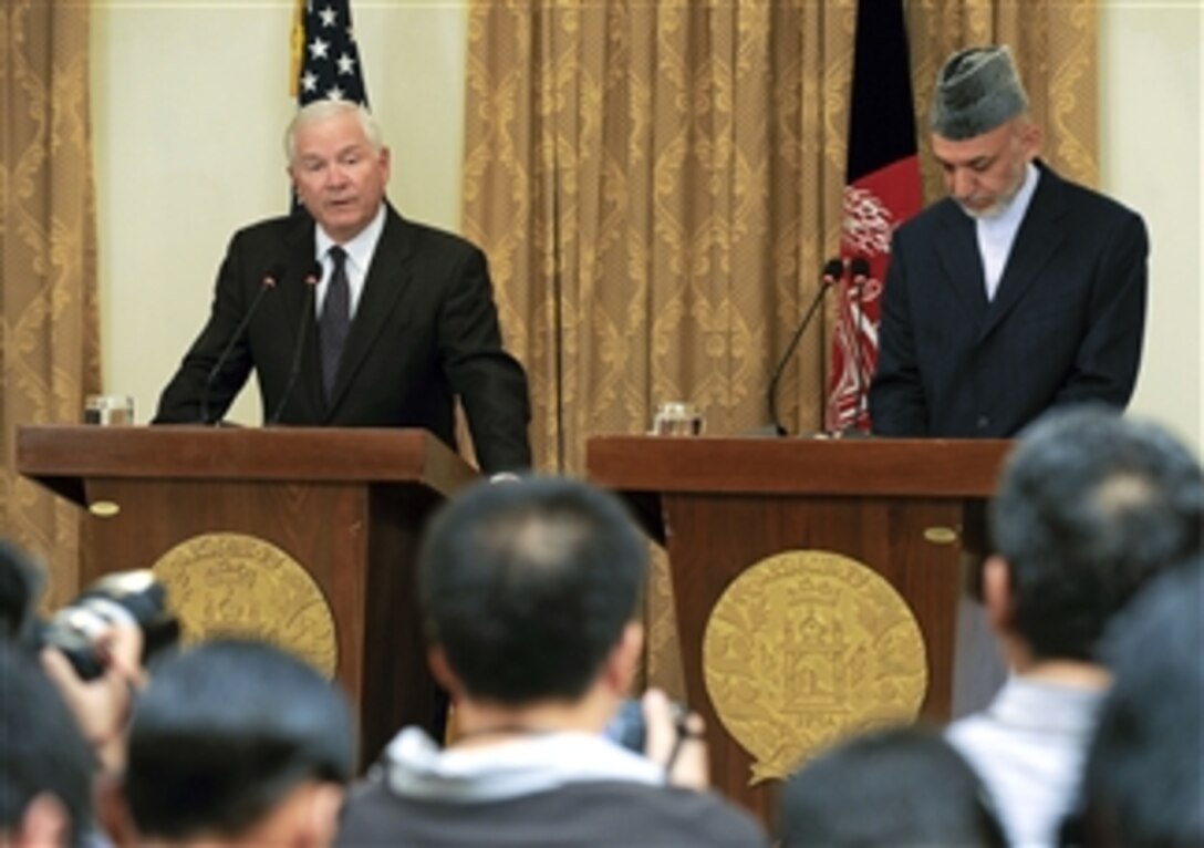 Secretary of Defense Robert M. Gates (left) gives his remarks to the press during a joint press conference with Afghan President Hamid Karzai in the Presidential Palace in Kabul, Afghanistan, on Sept. 2, 2010.  