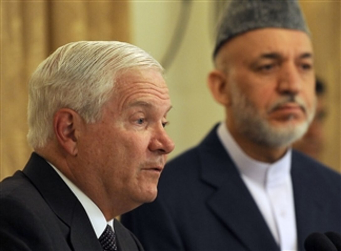 Secretary of Defense Robert M. Gates (left) gives his remarks to the press during a joint press conference with Afghan President Hamid Karzai in the Presidential Palace in Kabul, Afghanistan, on Sept. 2, 2010.  