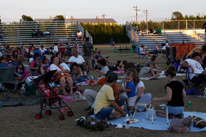 Community members lounge around the Torii Pines Golf Course here during the 2010 Summer Music Festival hosted by Marine Corps Community Services Saturday. The festival ran from 5 to 10 p.m and provided the crowd with live music, food and games.