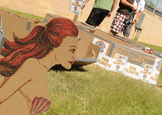 NELLIS AIR FORCE BASE, NEV.-- Members from various Nellis squadrons line up their boats prior to the Build-A-Boat competition Sept. 2.  (U.S Air Force photo by Senior Airman Stephanie Rubi)