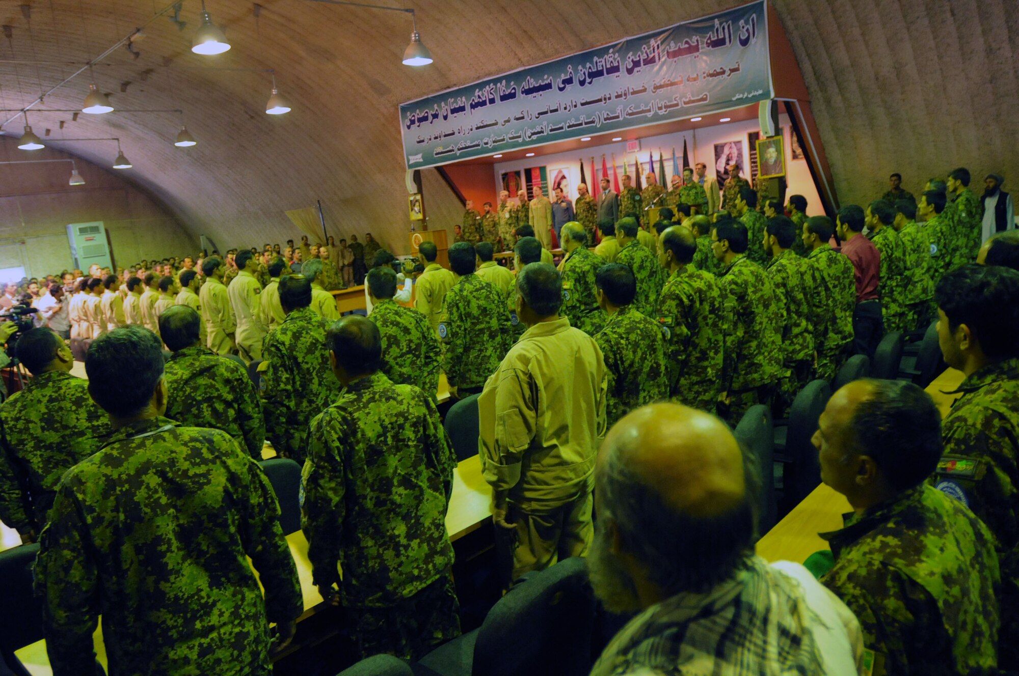 100904-N-6031Q-010 KABUL, Afghanistan -Afghan Air Force personnel are welcomed back home during a ceremony in the conference center of the AAF base in Kabul on Sep. 4, 2010 after providing flood relief to the neighboring country of Pakistan. Over the last 27 days, members of the AAF have been carrying out lifesaving humanitarian missions in Pakistan, demonstrating their strong operational capabilities. (US Navy photo by Mass Communication Specialist 2nd Class David Quillen/ RELEASED).