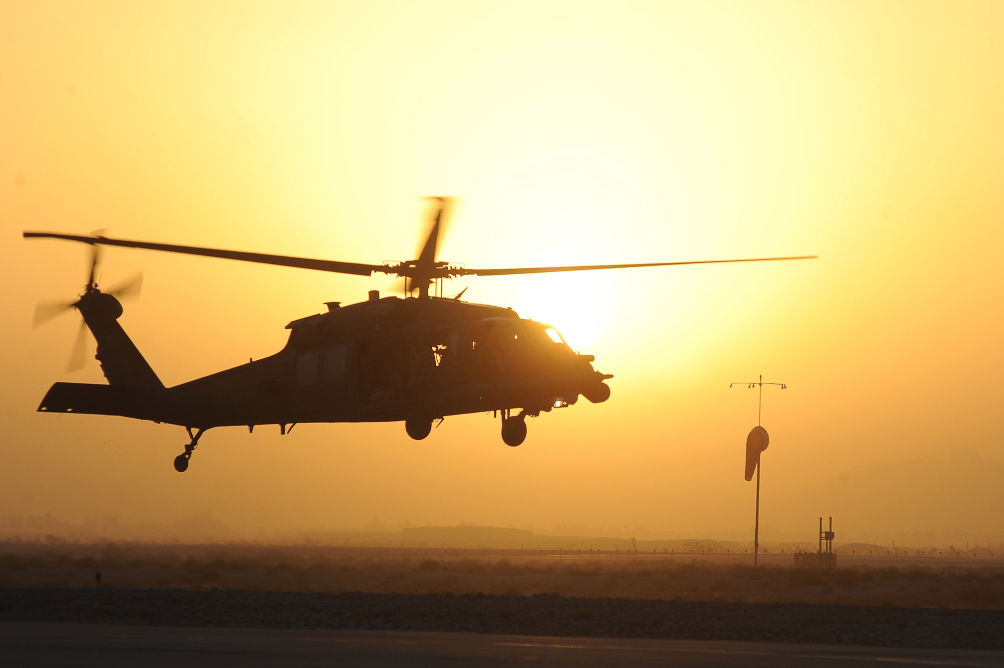 An HH-60G Pave Hawk helicopter, flown by Airmen of the 26th Expeditionary Rescue Squadron, prepares to land on Sept. 2, 2010, at Kandahar Airfield, Afghanistan. (U.S. Air Force photo by Tech. Sgt. Chad Chisholm/Released)