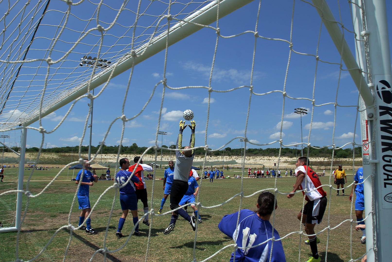 The Randolph Air Force Base goal keeper makes a save which which prevents Cannon AFB from scoring, while Randolph scored two. Randolph Air Force Base soccer team plays other intramural teams from other Air Force bases from across the United States. The games were part of 2010 Defender's Cup held at the South Texas Area Regional Soccer Complex in San Antonio, Texas.  (U.S. Air Force Photo/Brian McGloin)