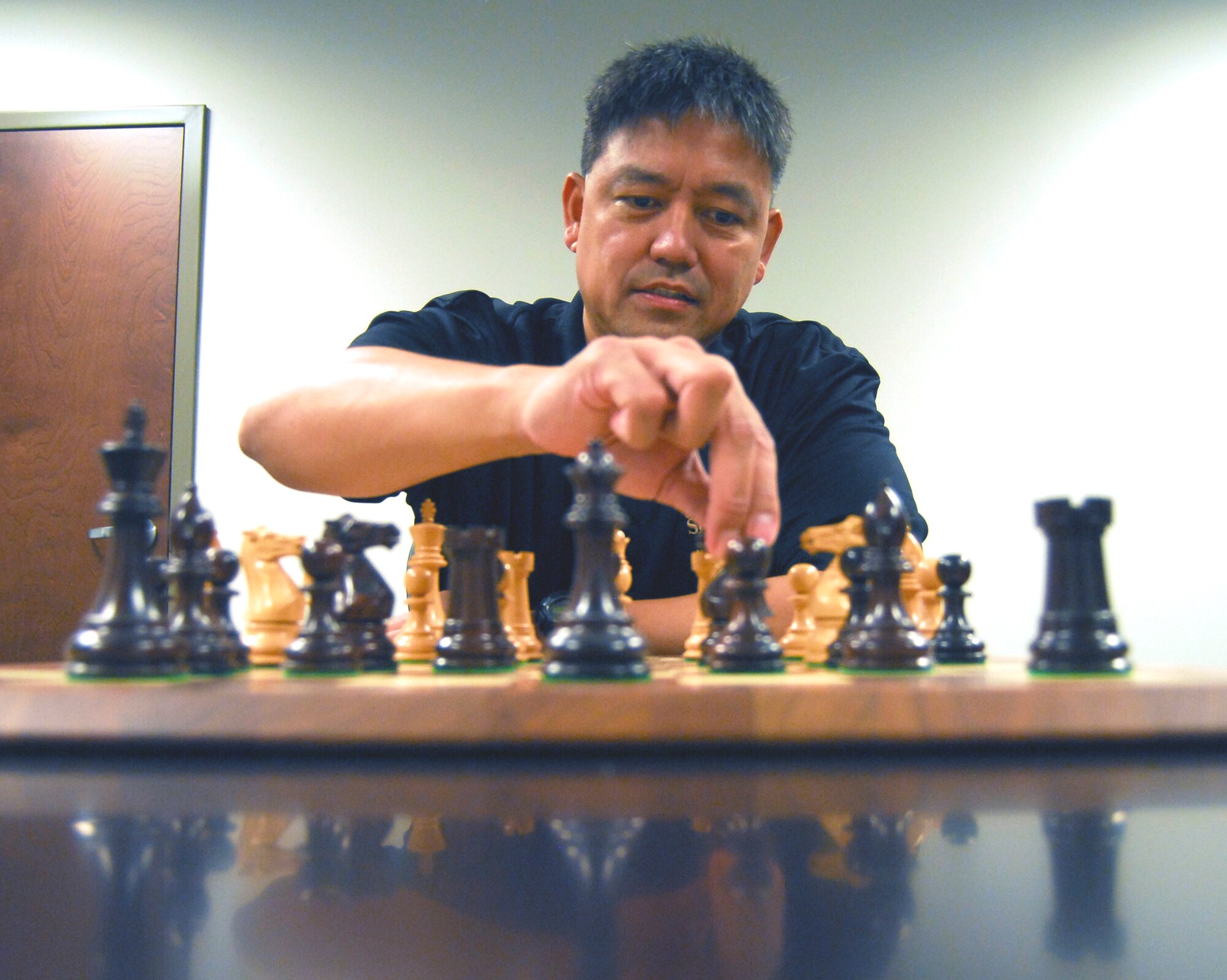 Master Sgt. Dan Ranario defeated top chess players from each service during the 2010 Interservice Chess Championship. He will represent the U.S. in the 2010 NATO Chess Championship in Koege, Denmark. Sergeant Ranario is assigned to the 3rd Aerial Port Squadron at Pope Air Force Base, N.C. (U.S. Air Force photo/Senior Airman Kris Levasseur)