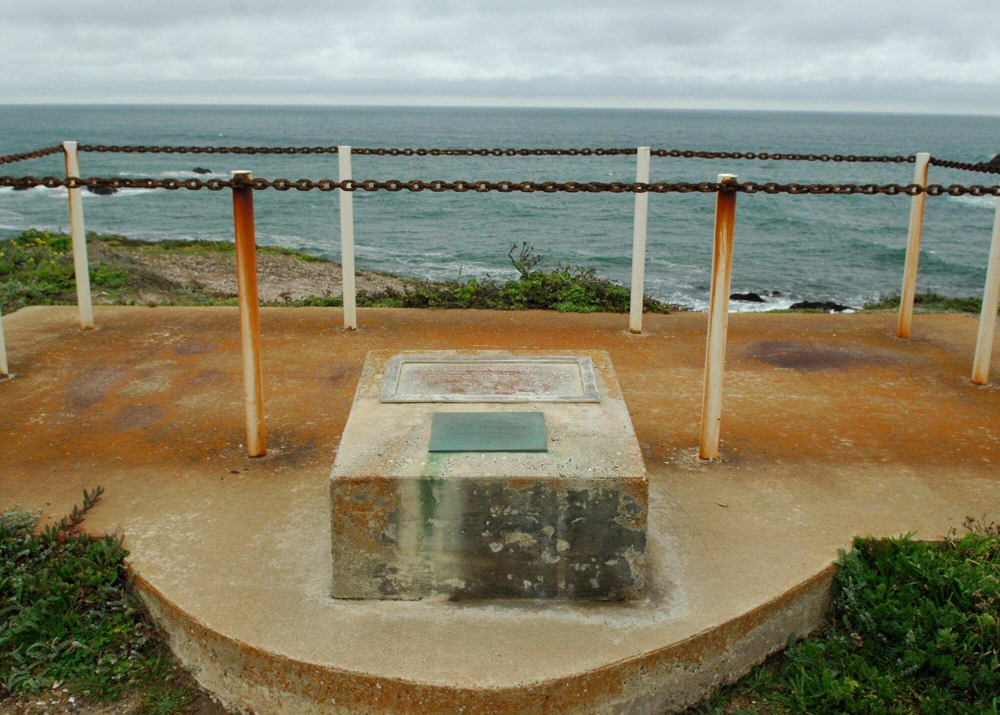 VANDENBERG AIR FORCE BASE, Calif.  -- A weathered plaque resting on top of a cliff here overlooks the Pacific Ocean at the location known as Honda Point. This memorial site was enacted to remember the 23 Sailors who lost their lives when  seven U.S. Navy destroyers crashed in 1923 off of the shore here.  (U.S. Air Force Photo/Senior Airman Heather Shaw)

