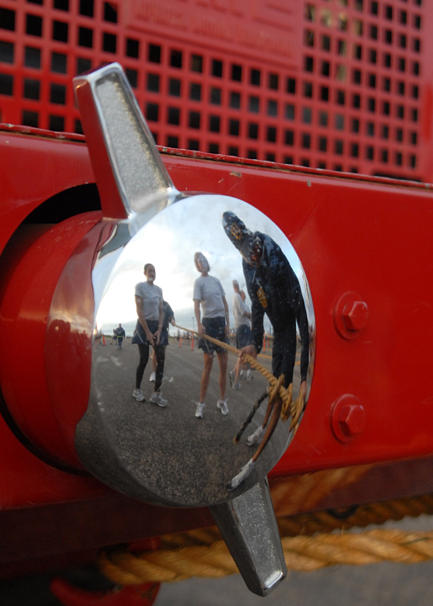GOODFELLOW AIR FORCE BASE, Texas -- 312th Training Squadron Firefighter instructors, cinch down a rope attached to the front of a fire truck. More than 10 teams of 10 Goodfellow members particpated in a truck pull, to kick off the Combined Federal Campain and Wing Quarterly Sports Day, Sept. 2. All branches of services participated in the event, which included a 1.5 mile run, individual and team relays. (U.S. Air Force photo/ Senior Airman Tong Duong)