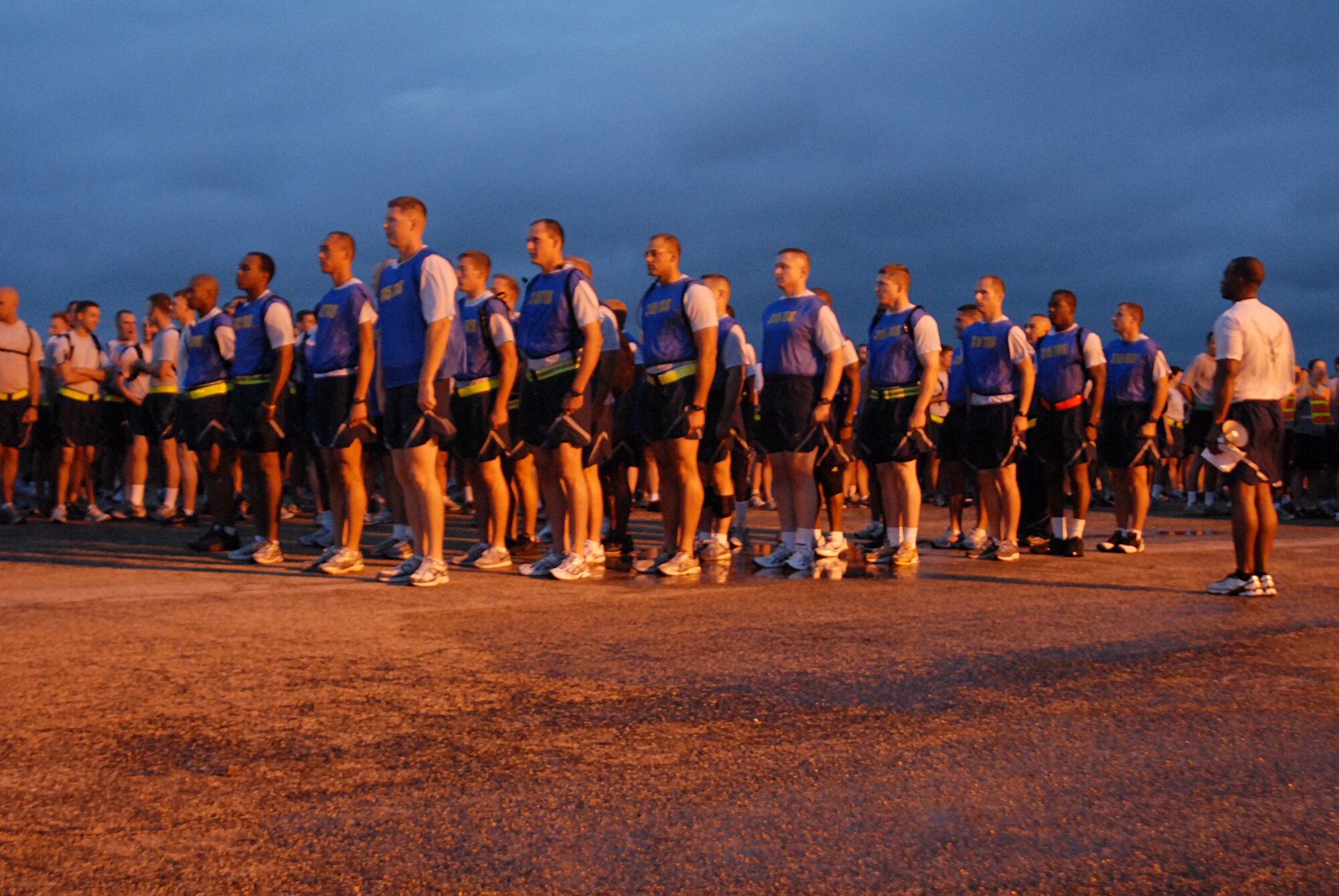 GOODFELLOW AIR FORCE BASE, Texas -- Staff Sgt. Jamaal Chesney, 315th Training Squadron, sizes up Operations Intelligence students prior to the start of the Wing Quarterly Sports Day, Sept. 2. All branches of services participated in the event, which included a fire truck pull, individual and team relays. (U.S. Air Force photo/ Senior Airman Tong Duong)