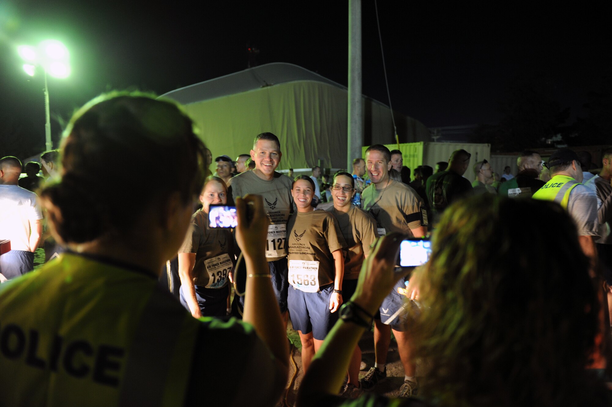 U.S. Air Force members pose for a photo prior to running in the Air Force-sponsored Half Marathon Sept. 4, 2010 at Bagram Airfield, Afghanistan. More than 1,000 members of Team Bagram ran in the event.