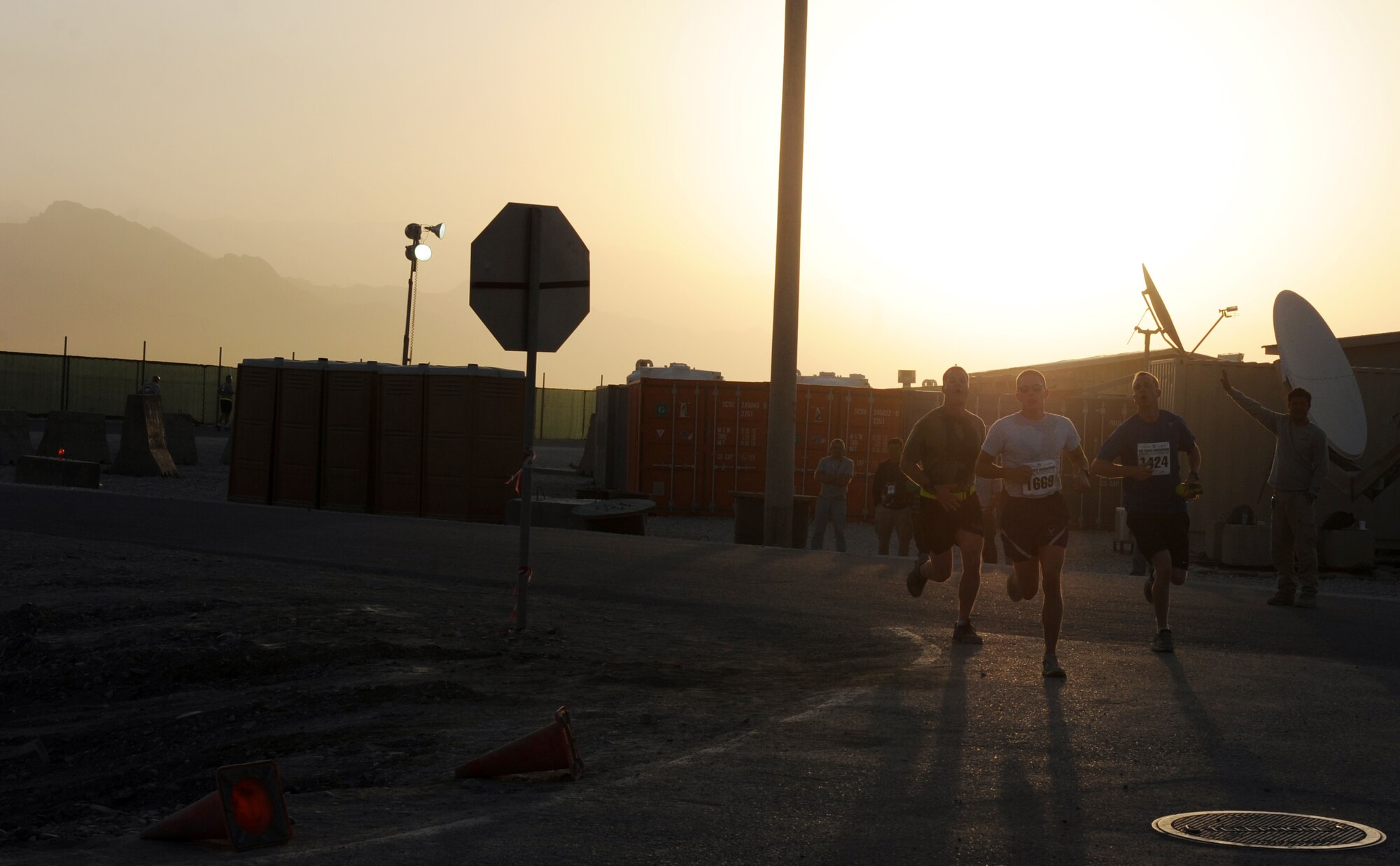 Participants turn the corner during the Air Force-sponsored Half Marathon Sept. 4, 2010 at Bagram Airfield, Afghanistan. More than 1,000 members of Team Bagram ran in the event. 