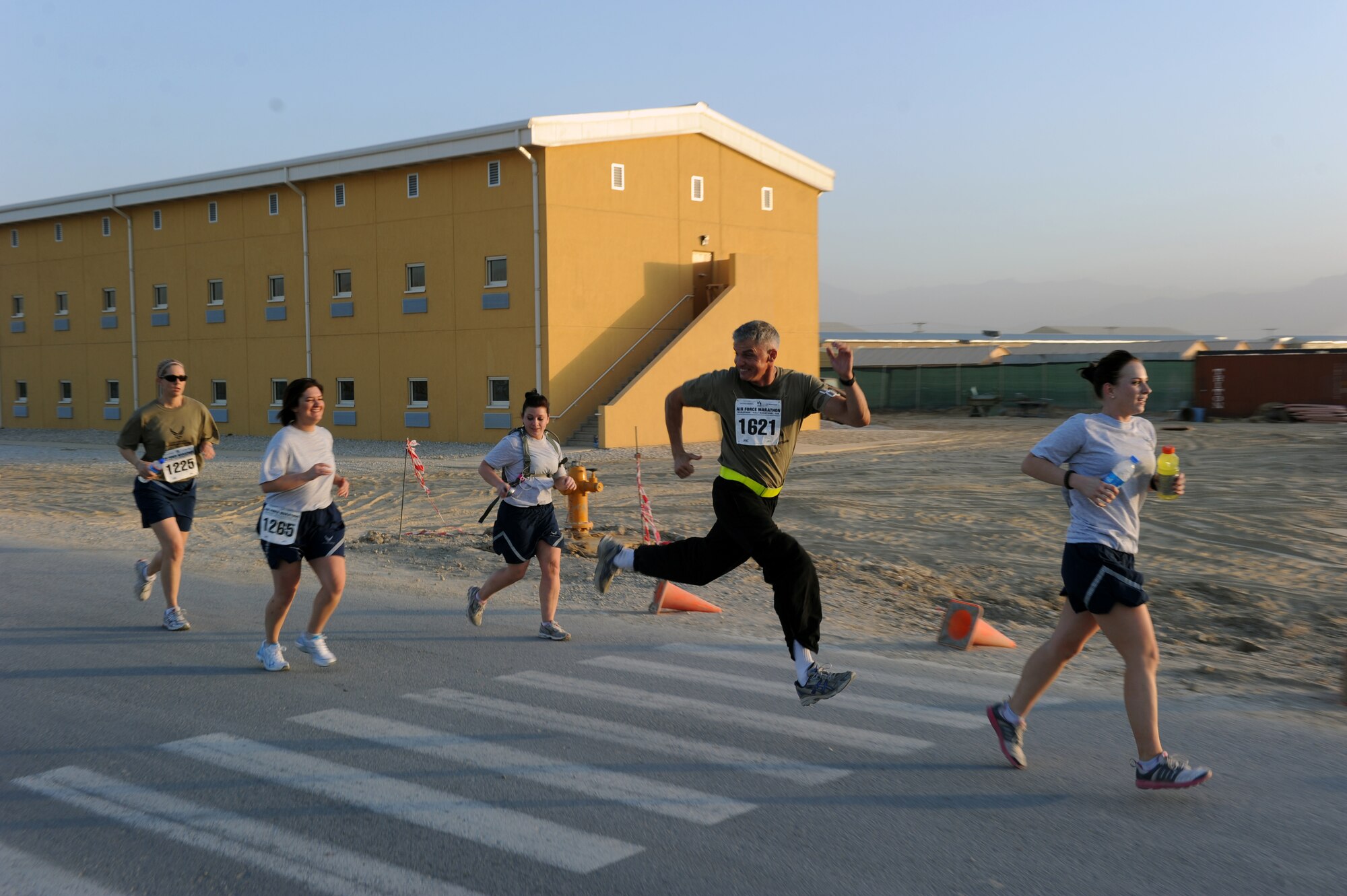 Particpants have a little fun during the Air Force-sponsored Half Marathon Sept. 4, 2010 at Bagram Airfield, Afghanistan. More than 1,000 members of Team Bagram ran in the event.