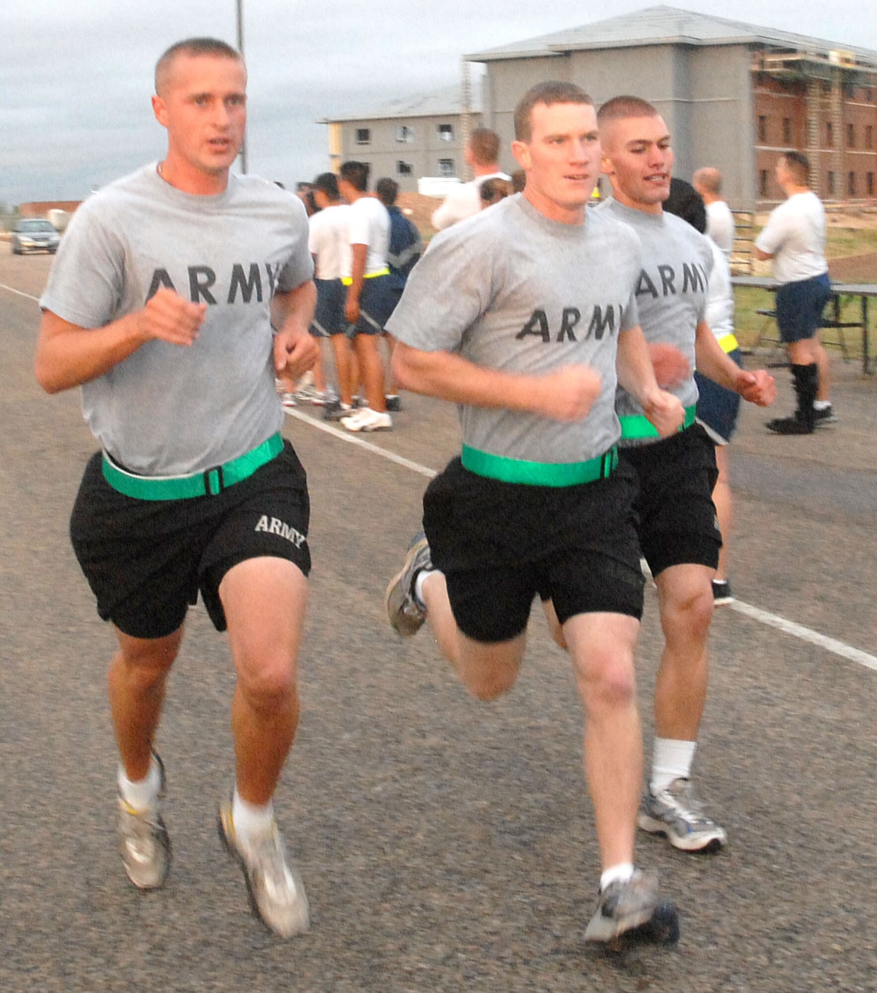 Army servicemembers here complete a two mile run at the flightline. The run was the first event of the quarterly Sports Day event Sept. 3. (U.S. Air Force photo/Airman 1st Class Jessica D. Keith)