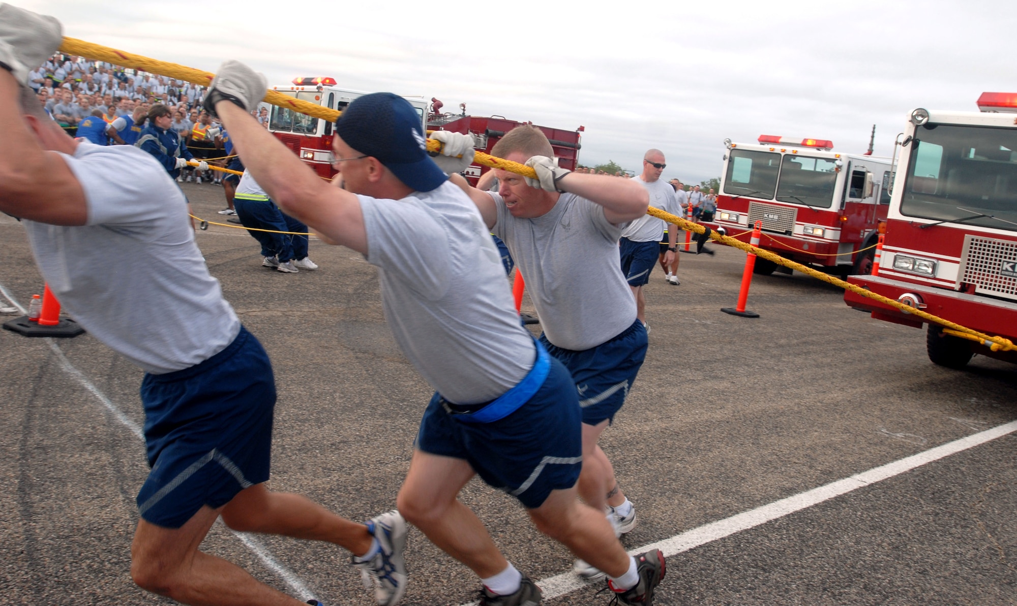 Goodfellow servicemembers here compete in the Fire Truck Pull Sept. 3. The event celebrated the kickoff of the Combined Federal Campaign, which supports local and national charities. (U.S. Air Force photo/Airman 1st Class Jessica D. Keith)