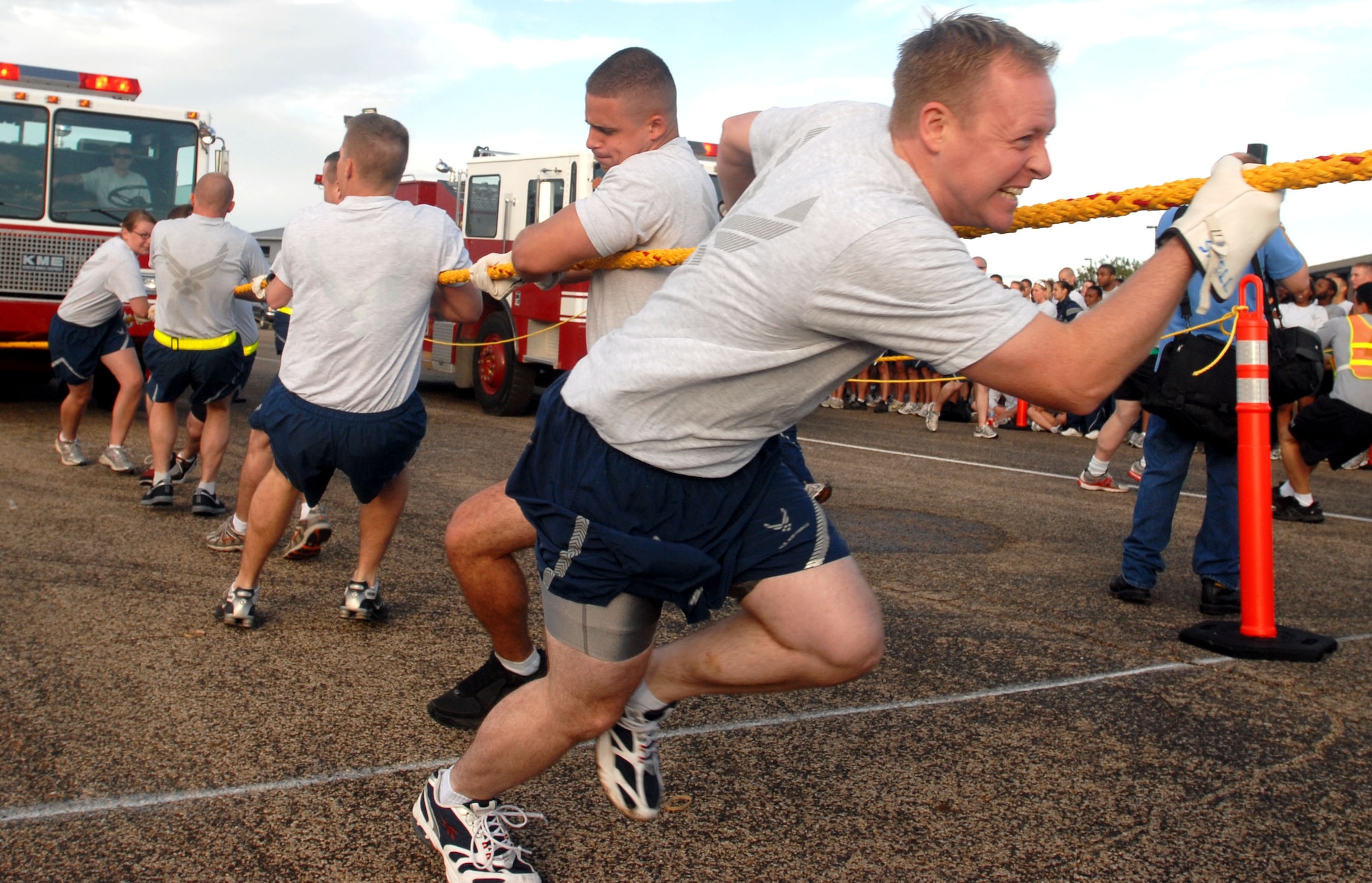 Goodfellow servicemembers here compete in the Fire Truck Pull Sept. 3. The event celebrated the kickoff of the Combined Federal Campaign, which supports local and national charities. (U.S. Air Force photo/Airman 1st Class Jessica D. Keith)