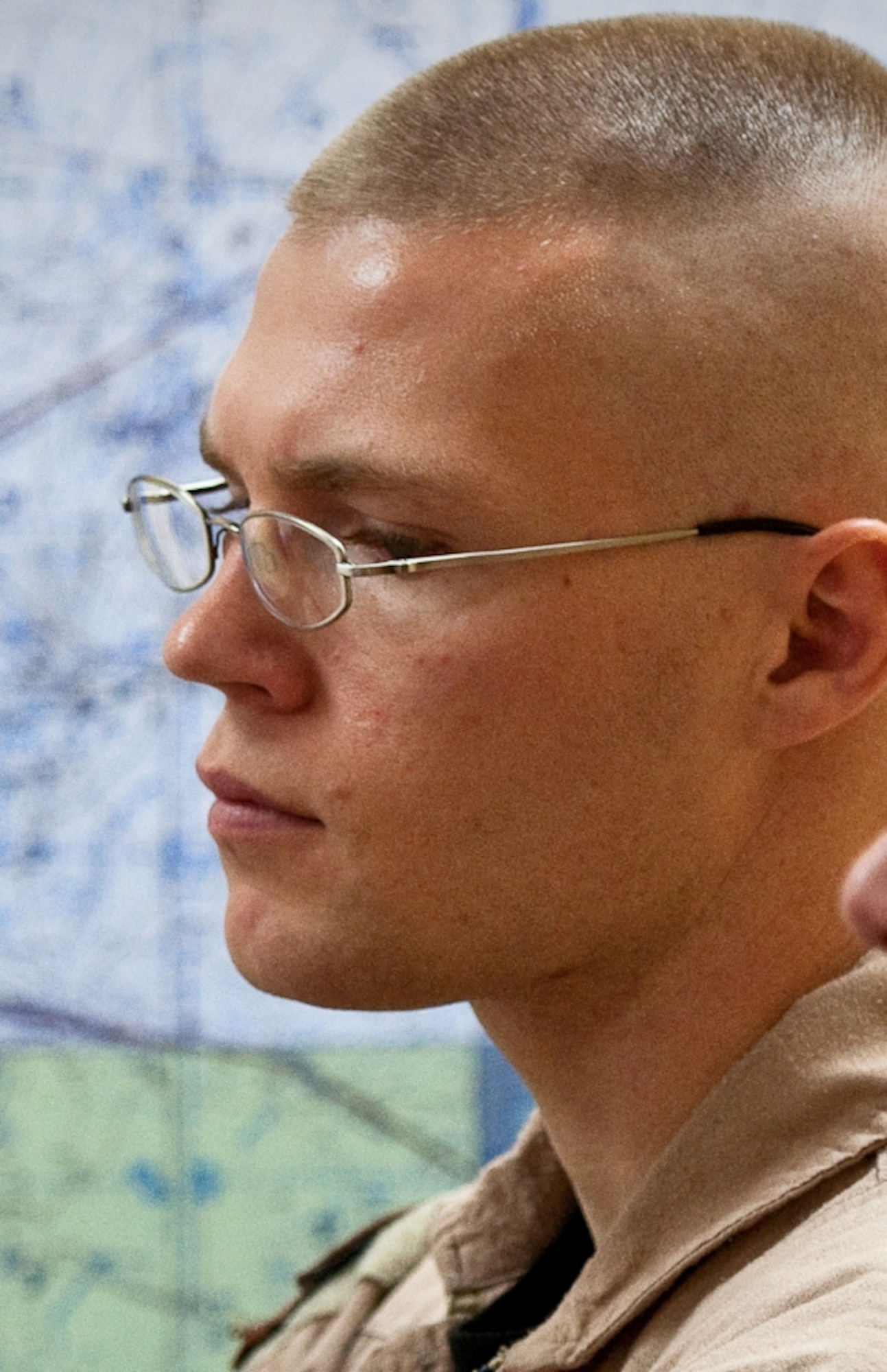 Staff Sgt. Steve Otto, C-130 loadmaster with the 737th Expeditionary Airlift Squadron, listens to a pre-flight intelligence briefing at an undisclosed air base in Southwest Asia on Aug. 30, 2010, as Airmen from the 386th Air Expeditionary Wing prepare to fly relief supplies into Pakistan. Sergeant Otto is deployed from the 40th Airlift Squadron, 317th Airlift Group, at Dyess Air Force Base, Texas. (U.S. Air Force Photo/Maj. Dale Greer)