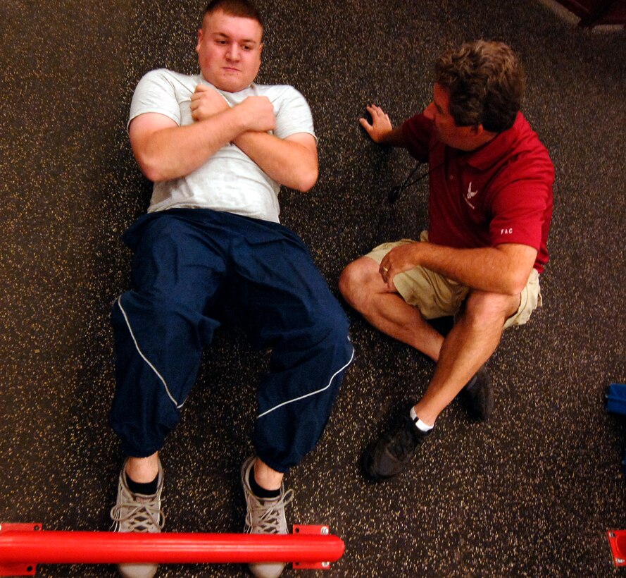 MOUNTAIN HOME AIR FORCE BASE, Idaho – An Airman performs push-ups during a recent fitness test at the Fitness Assessment Cell in the Mountain Home Fitness Center. The new test requires Airmen to be in even better combat readiness form. Airmen must perform at least the minimum requirements in each category in order to pass. (U.S Air Force photo by Airman Samuel Anderson)
