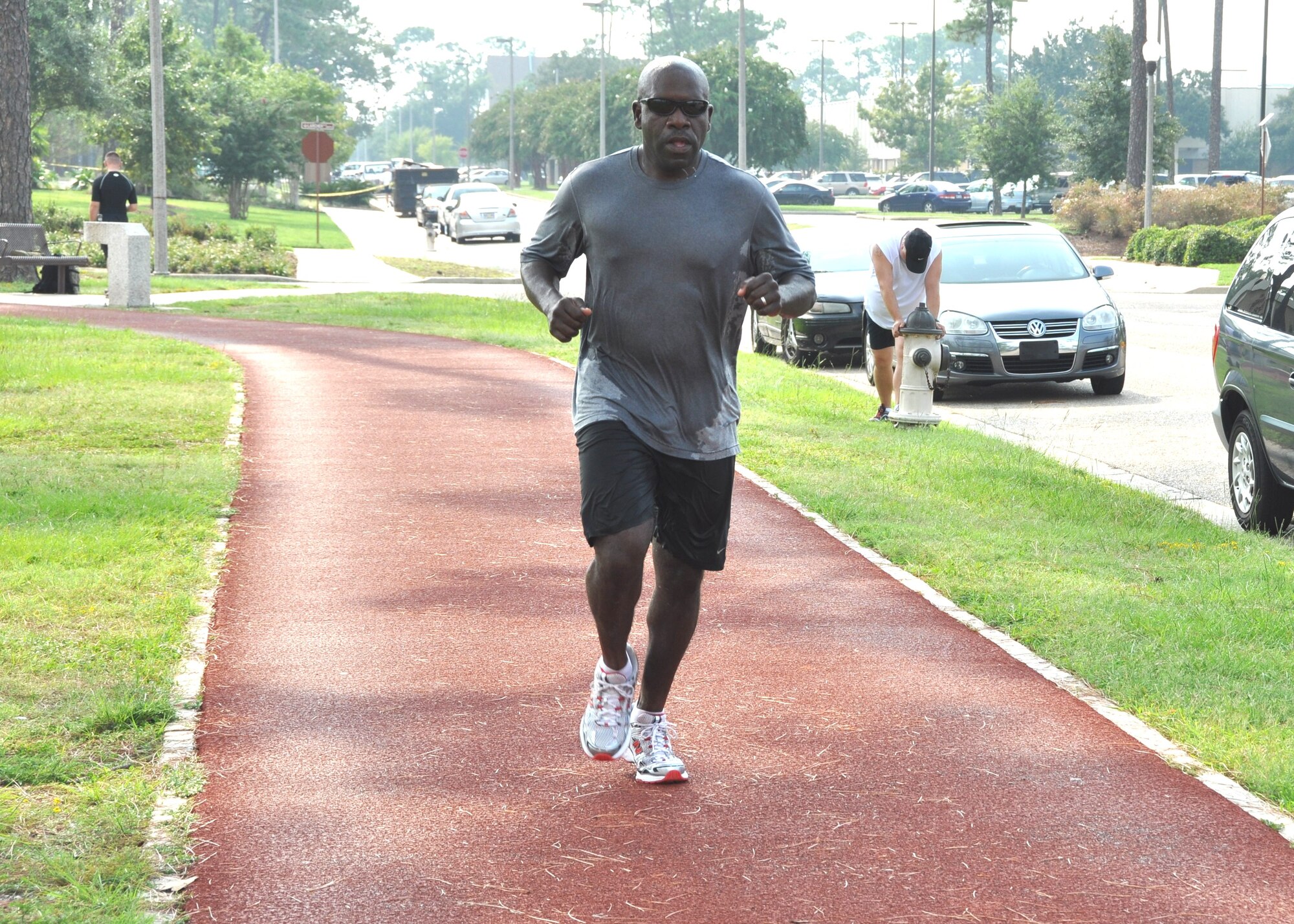 Joseph Wheeler, 81st Inpatient Operations Squadron first sergeant, completes a 5-mile run on the Crotwell Track Aug. 26.  He is spearheading a fundraiser for wounded, injured and ill service members sponsored by the Keesler First Sergeants Council by running in the annual Air Force Marathon Sept. 18 at Wright-Patterson Air Force Base, Ohio.  He hopes to raise $5,000 based on pledges for the number of miles he runs to benefit Keesler’s Wounded Warrior Program. Donations may be pledged per mile or be a flat donation.  He finished last year’s marathon in 5 hours, 40 minutes and hopes to complete the course this year in 4½ hours.  (U.S. Air Force photo by Steve Pivnick)