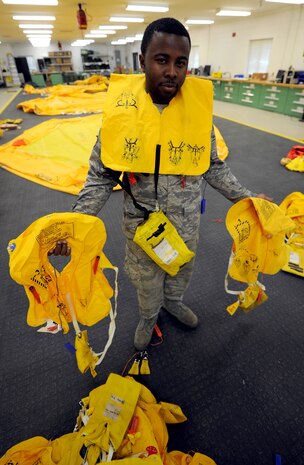 Staff Sgt. Rico Kones stands with life preservers surrounded by floatation equipment Sept. 1, 2010, on Joint Base Charleston, S.C. All floatation devices are put through a six-hour leaks check, ensuring all rafts and personal life preservers are ready to be packed and used. The C-17 Globemaster III has three 46-man rafts and 110 personal life preservers onboard in case of emergency, which are packed and maintained by the floatation shop. Sergeant Kones is an aircrew flight equipment craftsman with the 437th Operations Support Squadron. (U.S. Air Force photo/Senior Airman Timothy Taylor)