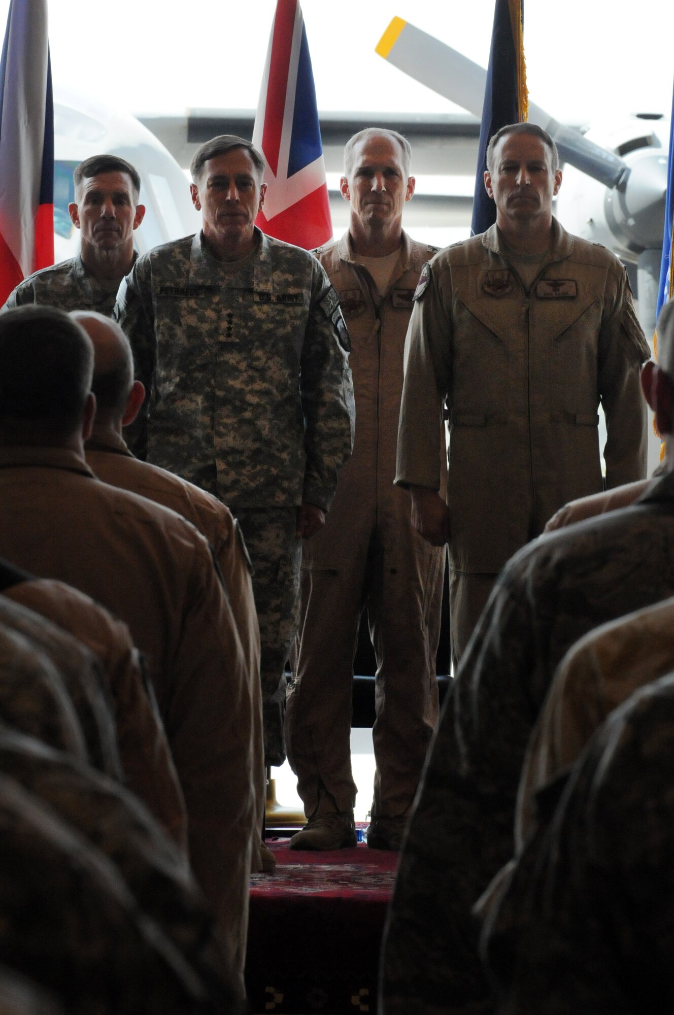 100907-N-6031Q-006 KABUL, Afghanistan -Gen. David Petraeus, Commander, International Security Assistance Force, Commander U.S. Forces Afghanistan, center-left, Lt. Gen. William B. Caldwell, Commanding General, NATO Training Mission and Combined Security Transition Command - Afghanistan,left, Lt. Gen. Gilmary Hostage, Commander, U.S. Air Forces Central Command, Southwest Asia, Brig. Gen. Michael Boera, Commanding General Combined Air Power Transition Force, and Brig. Gen. David W. Allvin, Commanding General, 438th Air Expeditionary Wing, NATO Air Training Command- Afghanistan, are presented during the change of command ceremony between Boera and Allvin held on the Afghan Air Force base in Kabul, Afghanistan on Sep. 7, 2010. The change of command from Boera to Allvin marks the end of CAPTF and the beginning of the newly name NATC-A.(US Navy photo by Mass Communication Specialist 2nd Class David Quillen/ RELEASED).