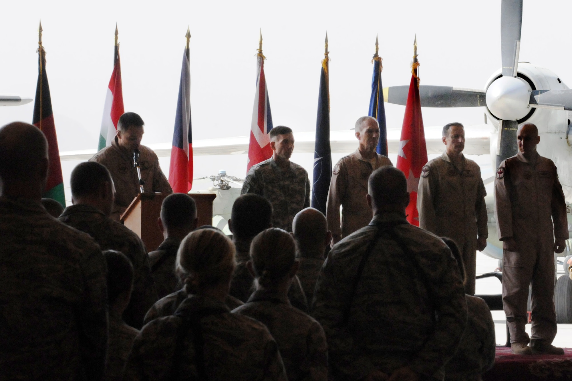 100907-N-6031Q-004 KABUL, Afghanistan - Lt. Gen. William B. Caldwell, Commanding General, NATO Training Mission and Combined Security Transition Command - Afghanistan,center, Lt. Gen. Gilmary Hostage, Commander, U.S. Air Forces Central Command, Southwest Asia, Brig. Gen. Michael Boera, Commanding General Combined Air Power Transition Force, and Brig. Gen. David W. Allvin, Commanding General, 438th Air Expeditionary Wing, NATO Air Training Command- Afghanistan, are presented during the change of command ceremony between Boera and Allvin held on the Afghan Air Force base in Kabul, Afghanistan on Sep. 7, 2010. The change of command from Boera to Allvin marks the end of CAPTF and the beginning of the newly name NATC-A.(US Navy photo by Mass Communication Specialist 2nd Class David Quillen/ RELEASED).