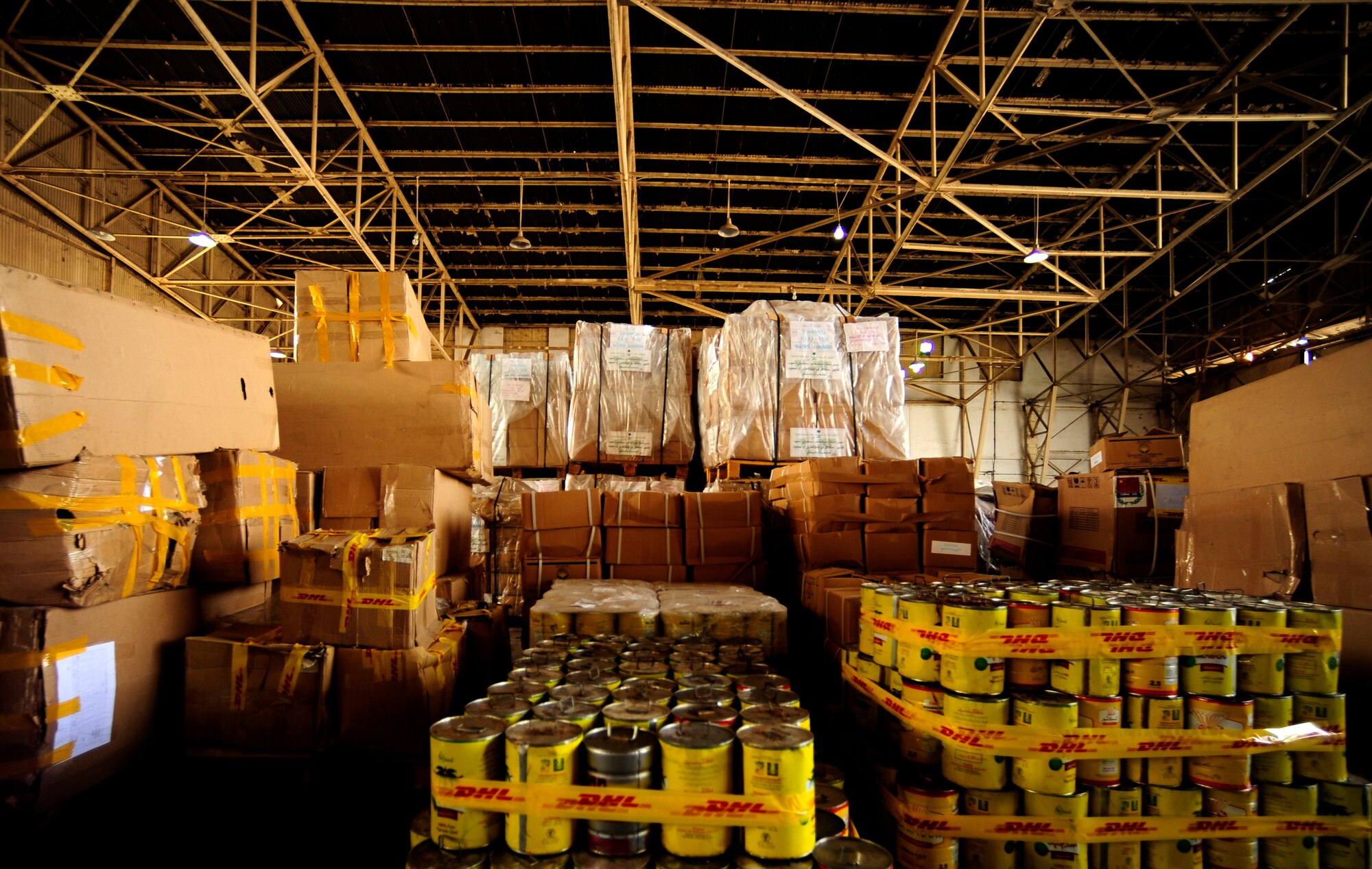 Tons of food and equipment fill a hangar at Chaklala Air Field, Pakistan in support of flood relief efforts on Aug. 28, 2010.   A U.S. Air Force Contingency Response Team from the 88th McGuire Air Force Base, NJ arrived today, taking over responsibilities for loading and off loading U.S. aircraft with supplies all over Pakistan. 

(U.S. photo taken by Staff Sgt. Andy M. Kin)
