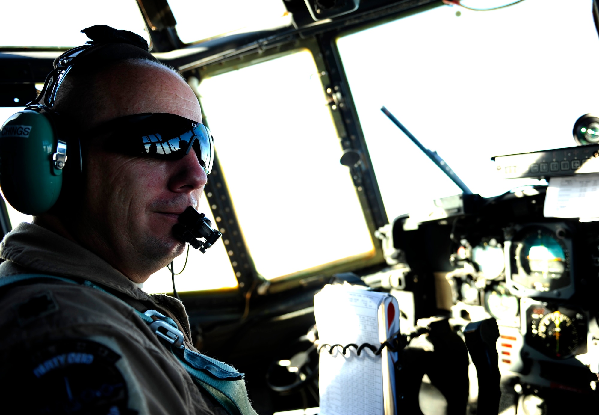 U.S. Air Force Lt. Col. Steve Catchings a C-130H Hercules pilot assigned to the 746th Expeditionary Airlift Squadron, poses for the camera during a flying mission to Chaklala Air Force Base, Pakistan in support of humanitarian relief efforts on Aug. 25, 2010. 
(U.S. Air Force photo by Staff Sgt. Andy M. Kin / Released) 