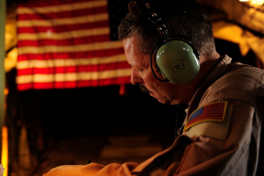 U.S. Air Force Senior Master Sgt. Chris Brown, a C-130H Hercules loadmaster assigned to the 746th Expeditionary Airlift Squadron, goes over all documents for cargo off load at Chaklala Air Force Base, Pakistan on Aug. 25, 2010. 746th EAS is staged out of Bagram Airfield, Afghanistan during Pakistan operations.(U.S. Air Force photo by Staff Sgt. Andy M. Kin / Released)