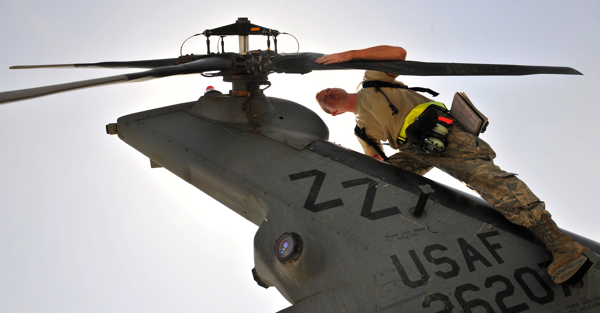Airman 1st Class Hunter Rains, a crew chief assigned to the 33rd Expeditionary Helicopter Maintenance Unit, performs a inspection of the tail rotor blade at Bagram Airfield, Afghanistan, Sept. 2, 2010. Airman Rains is a native of Bells, Tenn. (U.S. Air Force photo/Staff Sgt. Christopher Boitz)