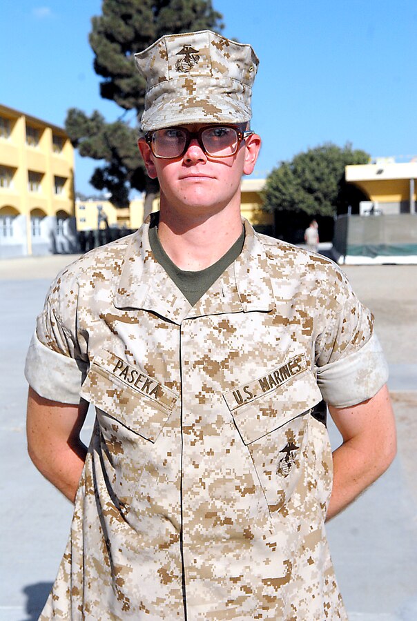 Pvt. Andrew Paseka, Platoon 1051, Company C, stands outside the recruit chow hall waiting for the rest of his platoon to finish evening chow. Paseka is older than most recruits who come through training. At the age of 24, he adds the Marine Corps’ values to his foundation of past experiences and strong moral character.