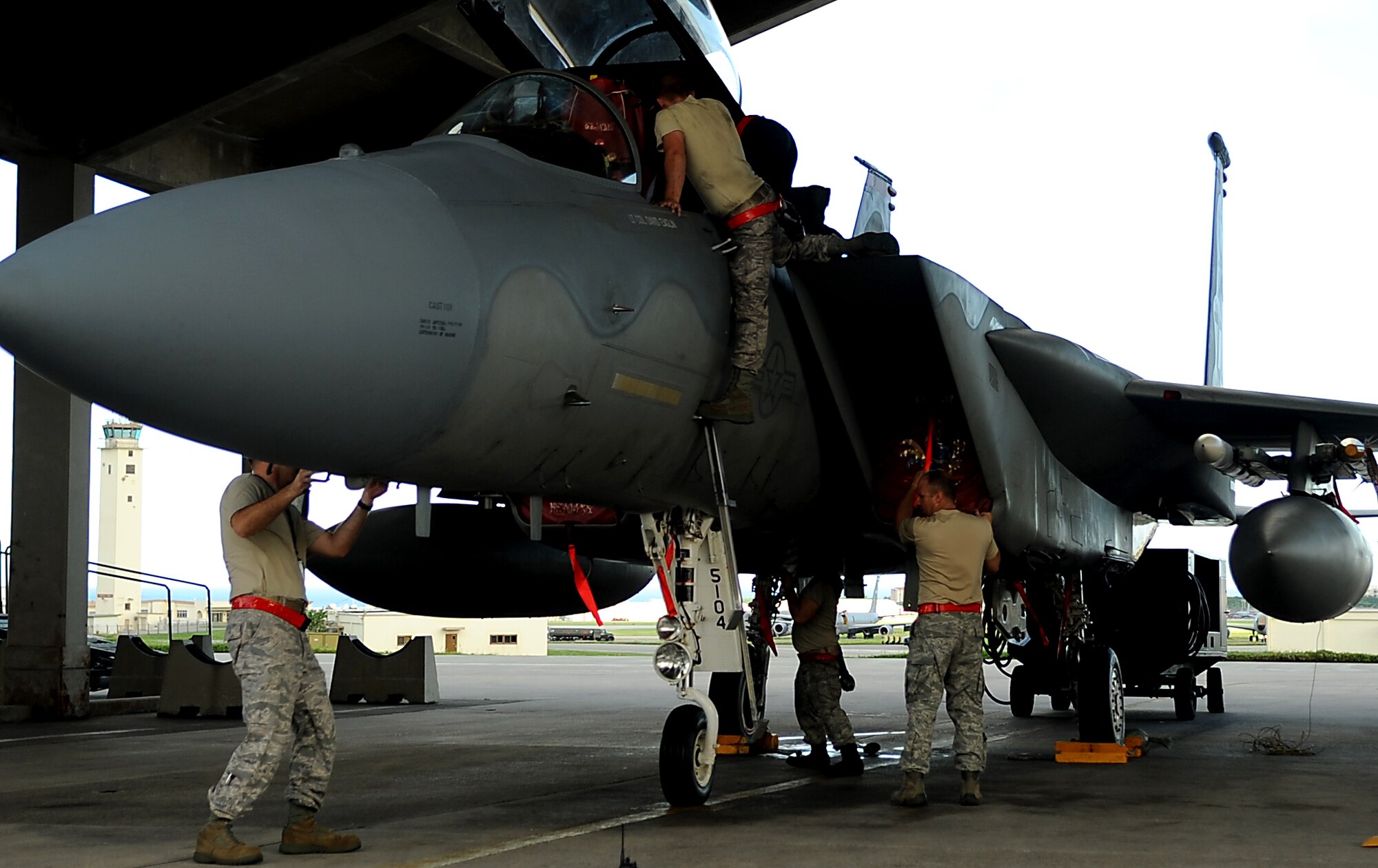 Maintenance crews with the 67th Aircraft Maintenance Unit prepare an F-15 for departure to Valiant Shield, a joint training exercise held in Guam, Sept. 8, 2010. More than 18 aircraft and 600 Kadena members deployed in support of the bi-annual operation. (US Air Force photo/Staff Sgt. Christopher Hummel)