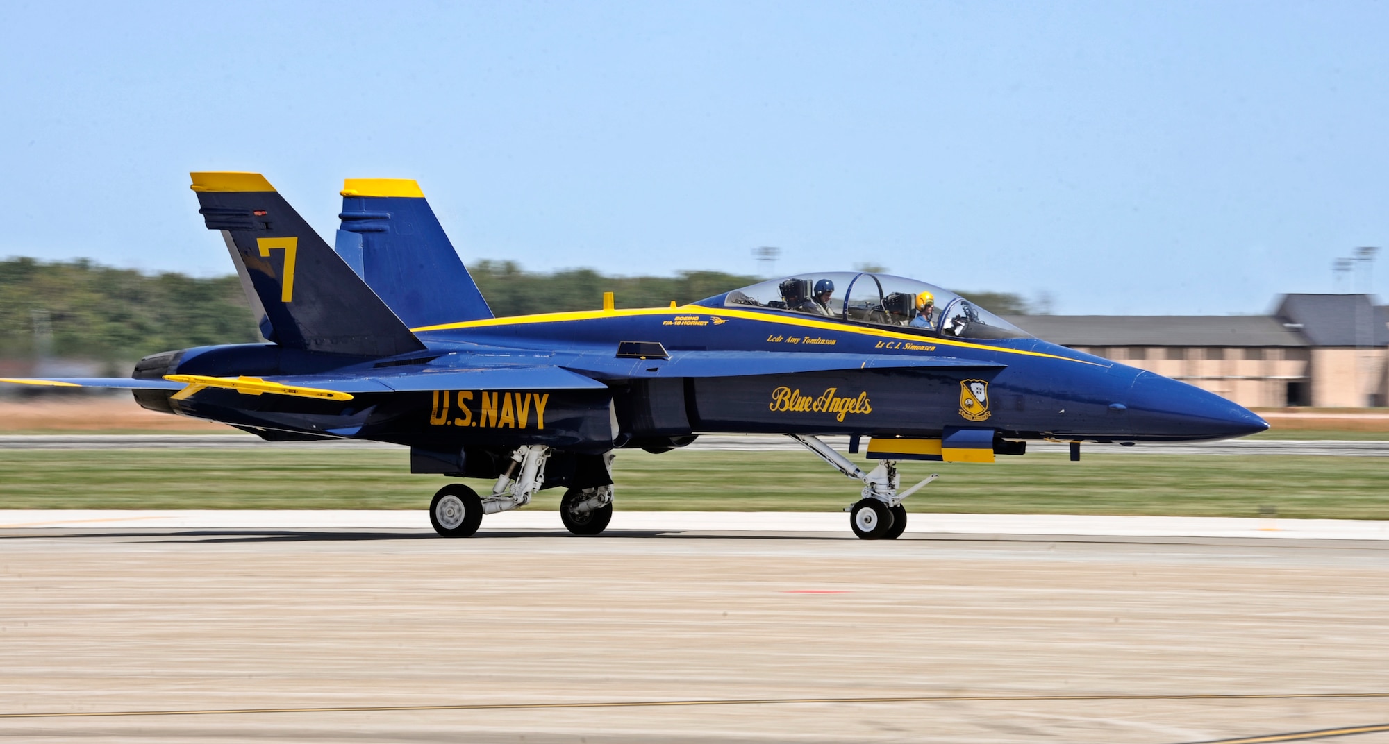 The Blue Angel #7 jet taxis down the flightline after a flight Sept. 8 at Scott AFB. The U.S. Navy in conjunction with the Scott Air Force Base air show, Airpower Over the Midwest, took two community leaders and one member of the media on orientation flights in an F/A-18 Hornet around the greater Scott area to give them a taste of what it?s like to be a military fighter pilot. (U.S. Air Force photo/ Staff Sgt. Ryan Crane)