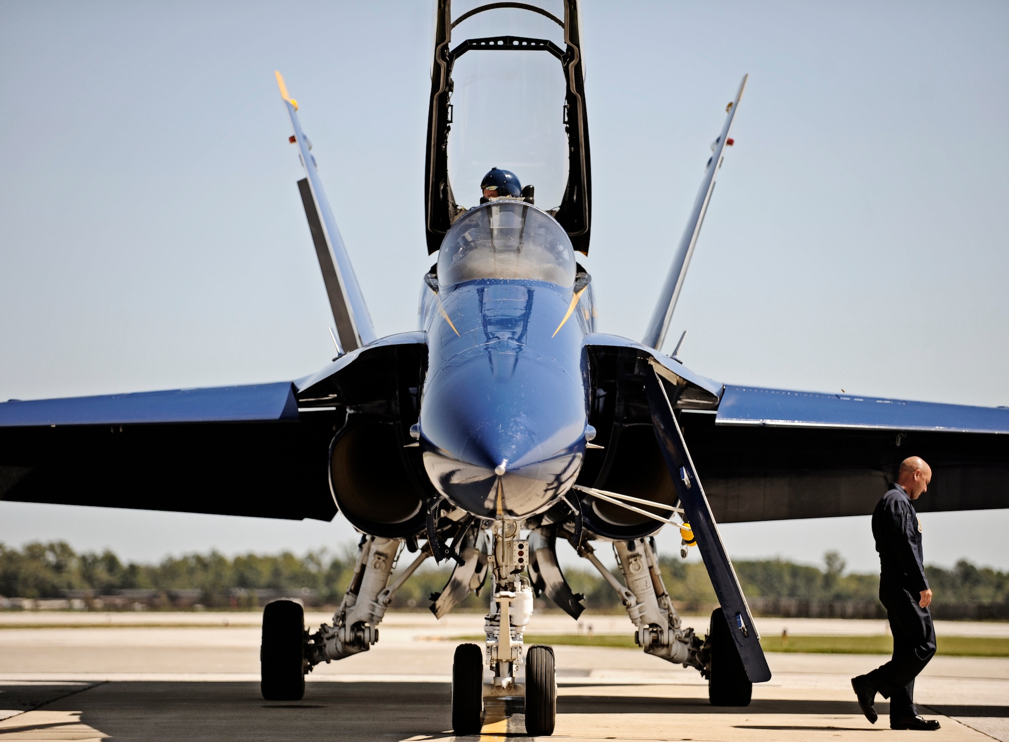 Farrell Shelton, high school history teacher and football coach, waits in the back of the Blue Angel #7 jet for the pilot to arrive Sept 8 at Scott AFB. The U.S. Navy in conjunction with the Scott Air Force Base air show, Airpower Over the Midwest, took two community leaders and one member of the media on orientation flights in an F/A-18 Hornet around the greater Scott area to give them a taste of what it?s like to be a military fighter pilot. (U.S. Air Force photo/ Staff Sgt. Ryan Crane)