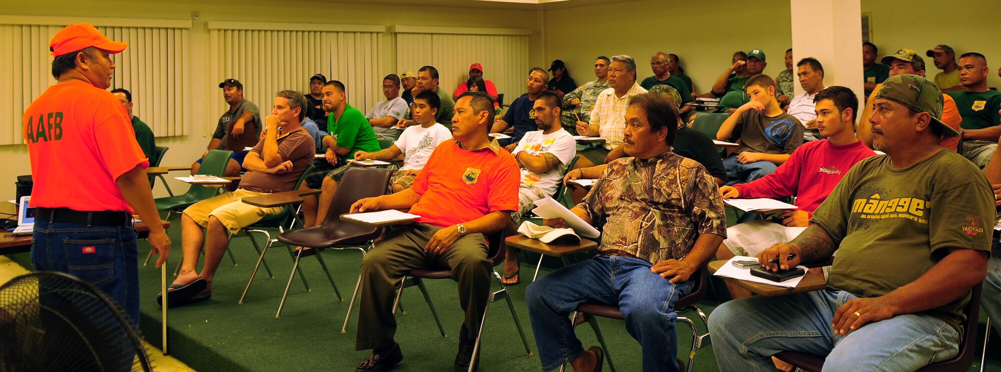 ANDERSEN AIR FORCE BASE, Guam - Members of Team Andersen attend the Hunter's Safety Briefing at the College of Agriculture and Life Science Building Sept. 2 in Mangilao. The briefing gives hunters an opportunity to renew their license and receive information on safety procedures and precautions. (U.S. Air Force photo by Airman Whitney Amstutz)