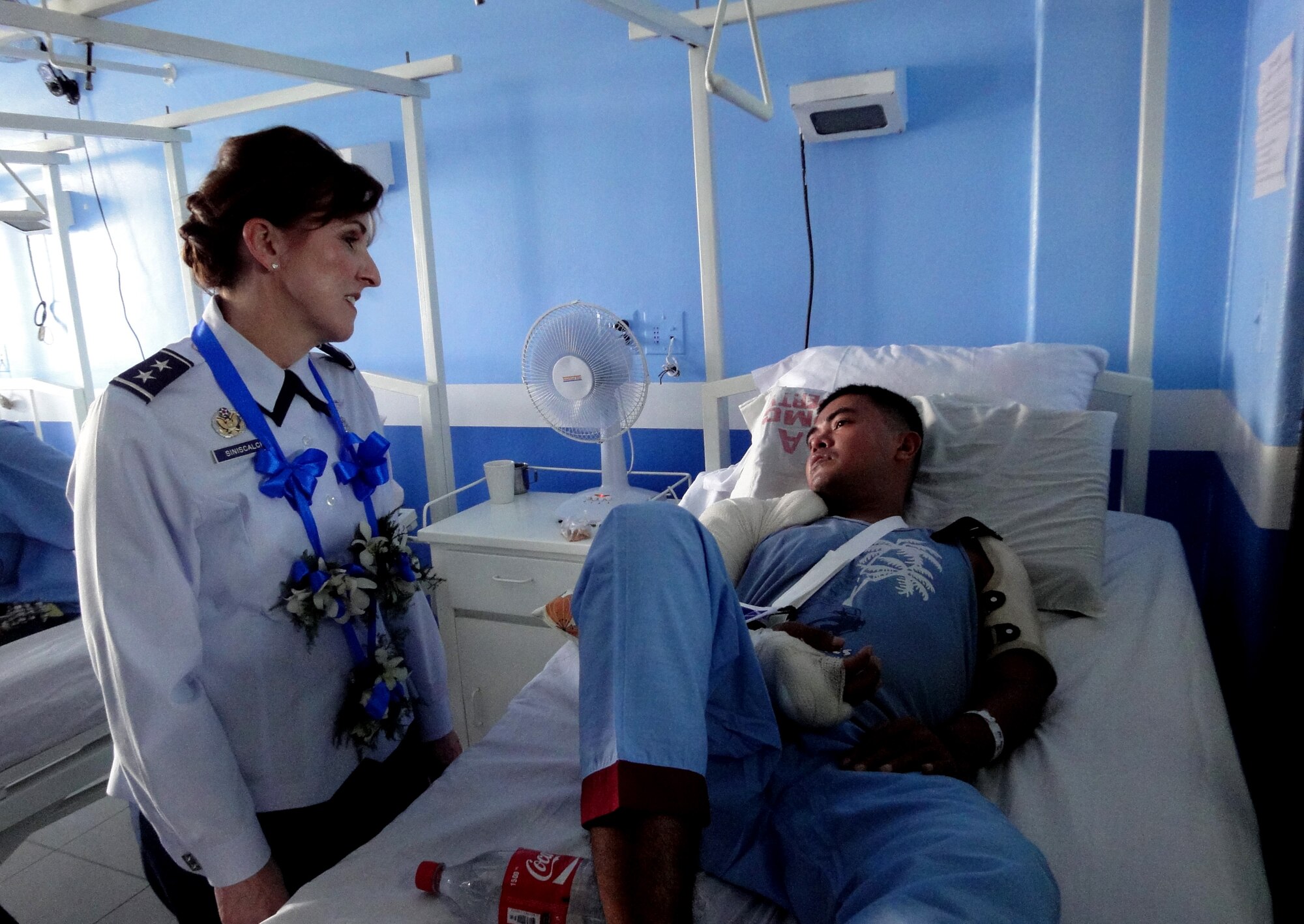 Maj. Gen. Kimberly Siniscalchi, the assistant Air Force Surgeon General, Medical Force Development, and assistant Air Force Surgeon General, Nursing Services, Office of the Surgeon General, visits a patient in the orthopedic ward at the Armed Forces of the Philippines medical center in Manila, Philippines, on Aug. 29, 2010 during the 4th annual Asia-Pacific Nursing Conference Symposium where more than 200 nurses from 13 countries were in attendance.  The seven-day conference, hosted by the Armed Forces of the Philippines Office of the Chief Nurse, in collaboration with U.S. Pacific Command and 13th Air Force, focused on nursing education, career development, global pandemic preparedness and disaster management. The symposium was designed to help nurses in senior leadership positions share ideas and practices in order to build relations between Asia-Pacific countries. The symposium concluded Sep. 4, 2010. (U.S. Air Force photo/ Tech. Sgt. Carlos Limo) 