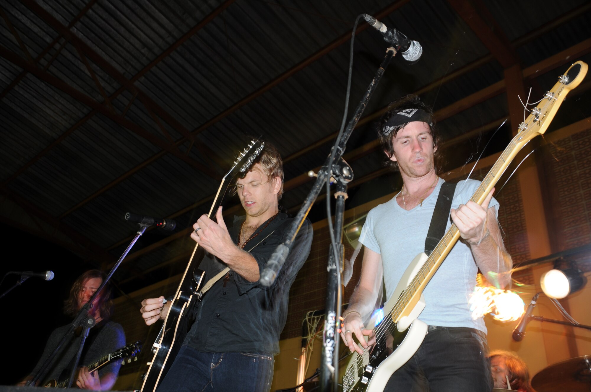 SOTO CANO AIR BASE, Honduras --  Bringing some rock to Honduras, up-and-coming Nashville band The Kicks entertain Team Bravo at a concert here Sept. 2. The band played a two-hour set before signing autographs and handing out albums to audience members afterward. (U.S. Army photo/Spc. Jennifer Grier)