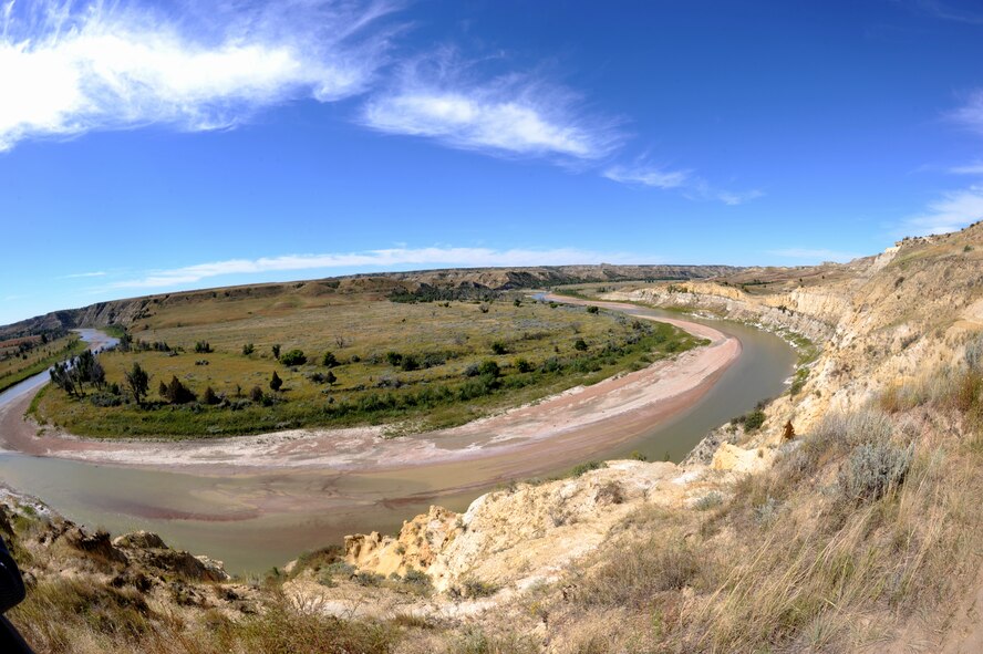 BADLANDS, N.D. -- The Missouri River cuts through Wind Canon in the badlands at the Theodore Roosevelt National Park here Sept. 3. Camping in the Theodore Roosevelt National Park allows one to explore the rugged badlands terrain and watch wildlife. (U.S. Air Force photo by Airman 1st Class Aaron-Forrest Wainwright)