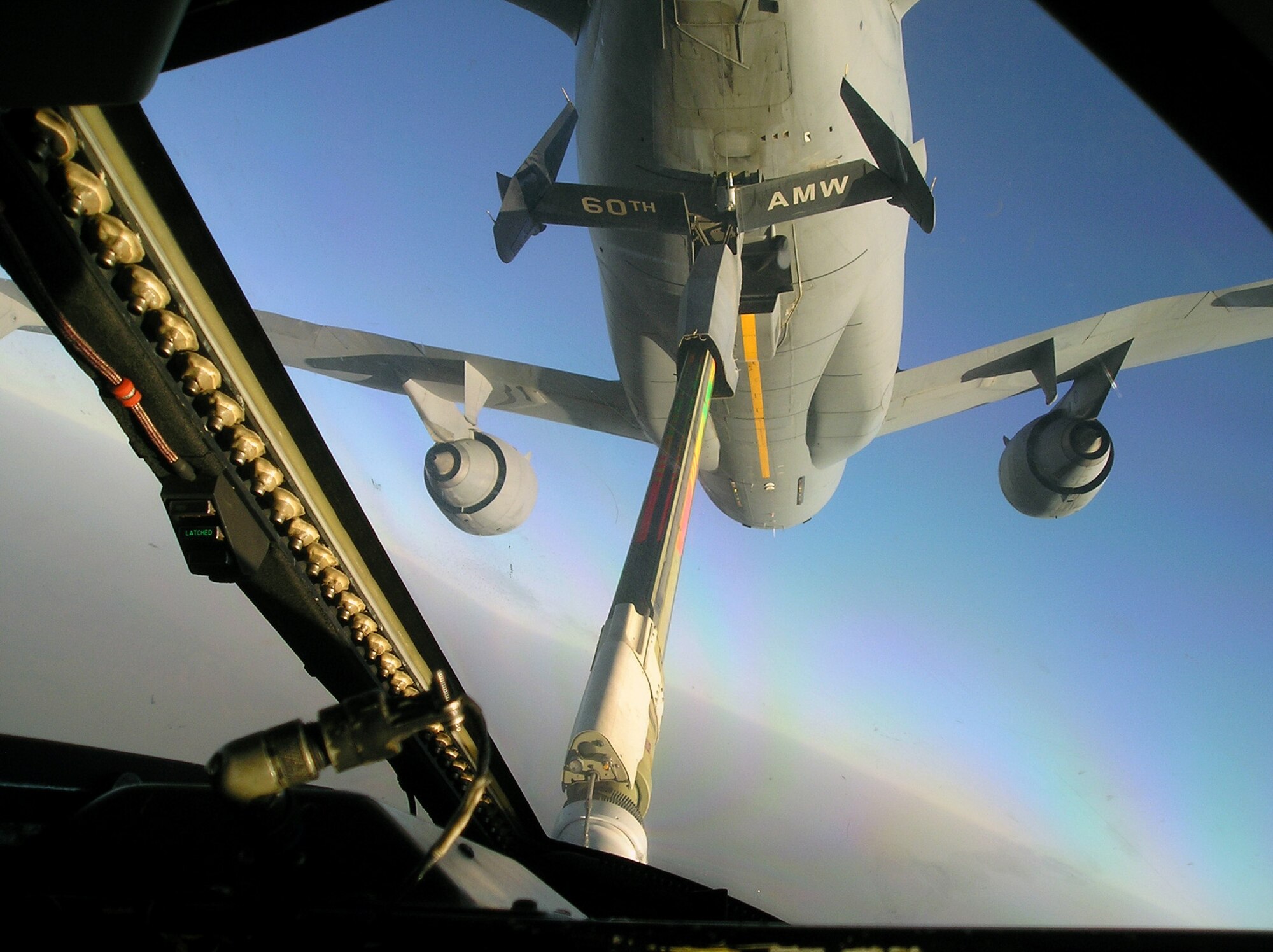 A KC-10 Extender from the 908th Expeditionary Air Refueling Squadron refuels an aircraft Feb. 1, 2010, over Afghanistan, during Operation Enduring Freedom air refueling operations. The air refueling capability of the KC-10 in combat operations allows fighters to provide close-air support for "troops in contact" in Afghanistan and other areas of operations.  (U.S. Air Force photo/Capt. Sean Chuplis) 