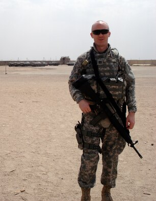 CONTINGENCY OPERATING BASE BASRA, Iraq.- Capt. Aaron Tritch waits for a convoy leaving for a forward operating base in his area of responsibility. He said he loved the deployed experience, but missed his child, who was four-months old when he left.
 