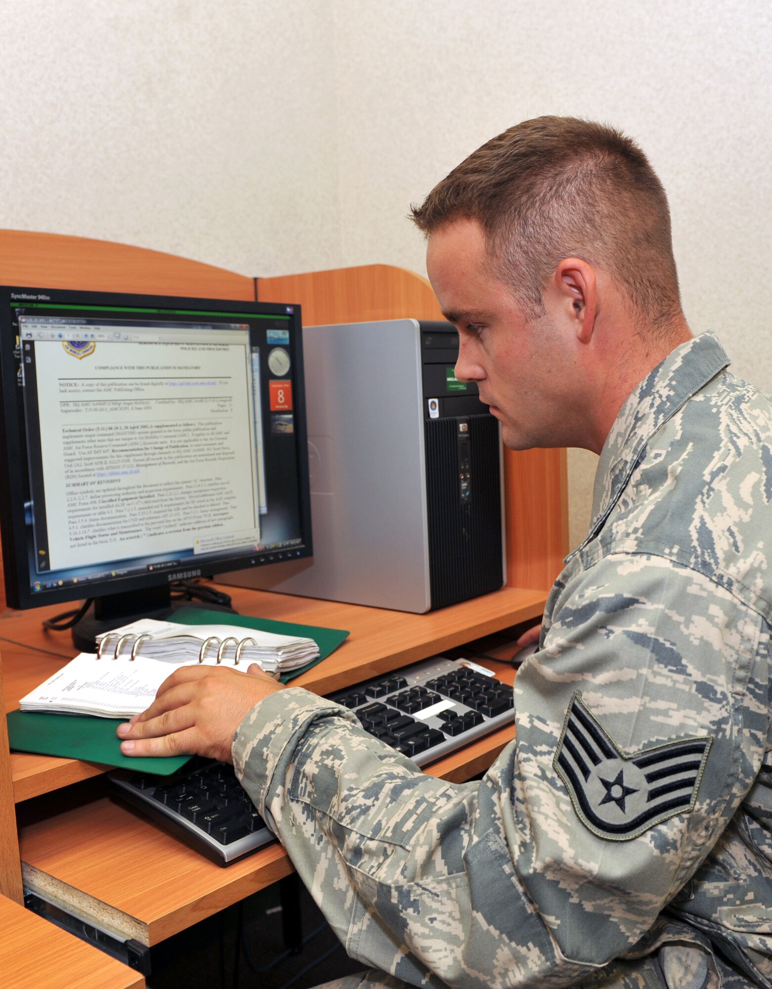 Staff Sgt. Ross McQuiggan, 19th Aircraft Maintenance Squadron aircraft maintenance journeyman, checks the part number for C-130E main landing gear brake here Sept. 8, using an H-4 part breakdown manual. The Bethany, Okla., native recently trained nine 3-level Airmen on 20 maintenance tasks, increasing the number of skilled crewchiefs within the squadron as well as mission-ready aircraft. (U.S. Air Force photo by Staff Sgt. Chris Willis)