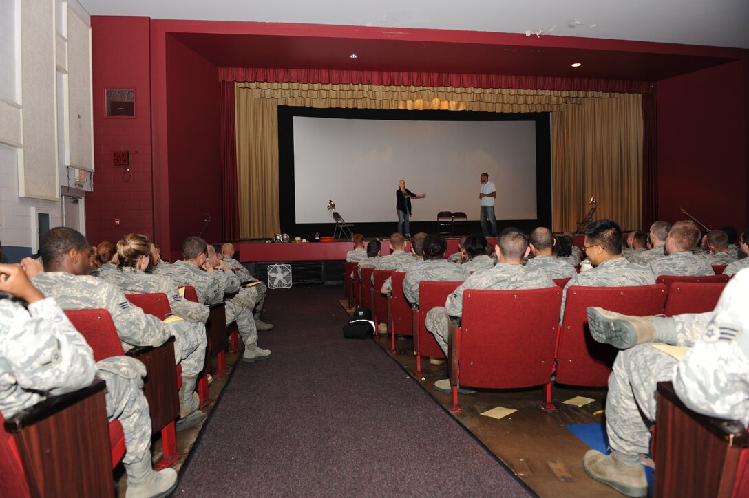 ELLSWORTH AIR FORCE BASE, S.D.-- Courtney Abbott  and DeRante Parker, an acting group from Chicago, Ill,  perform their skit during a "Sex Signals" event here, Sept. 2. Through improvisation and audience interaction, the play explores how social pressures, unrealistic fantasies, power inequity, and false preconceptions of the other sex all contribute to the tensions often found in dating. More than 875 Ellsworth Airmen attended the event. (U.S. Air Force photo/Master Sgt. Loren J. Bonser)